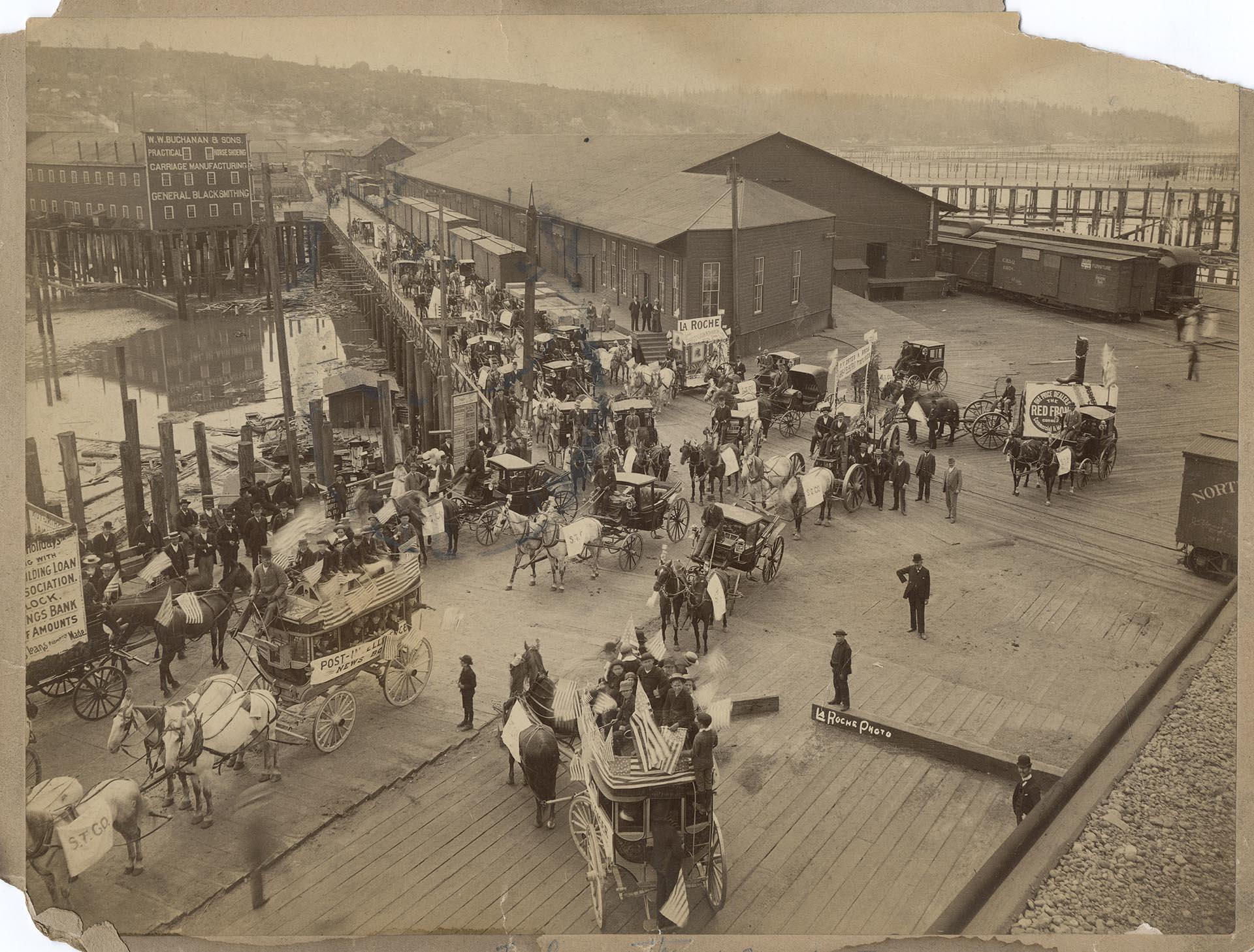 Image of July 4th parade at the waterfront, Seattle, July 4, 1891