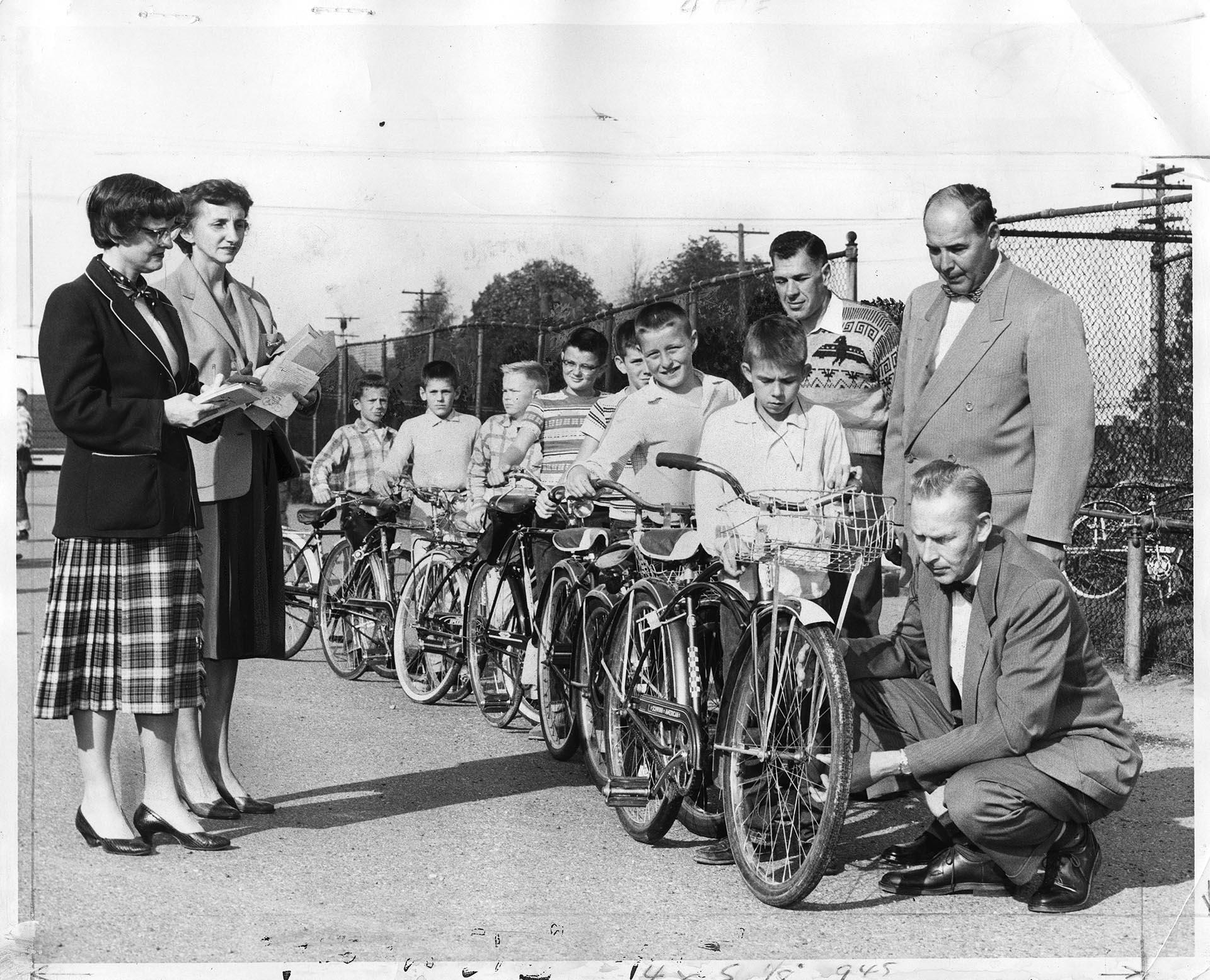 Image of PTA members inspecting students' bikes, Seattle, October 13, 1958