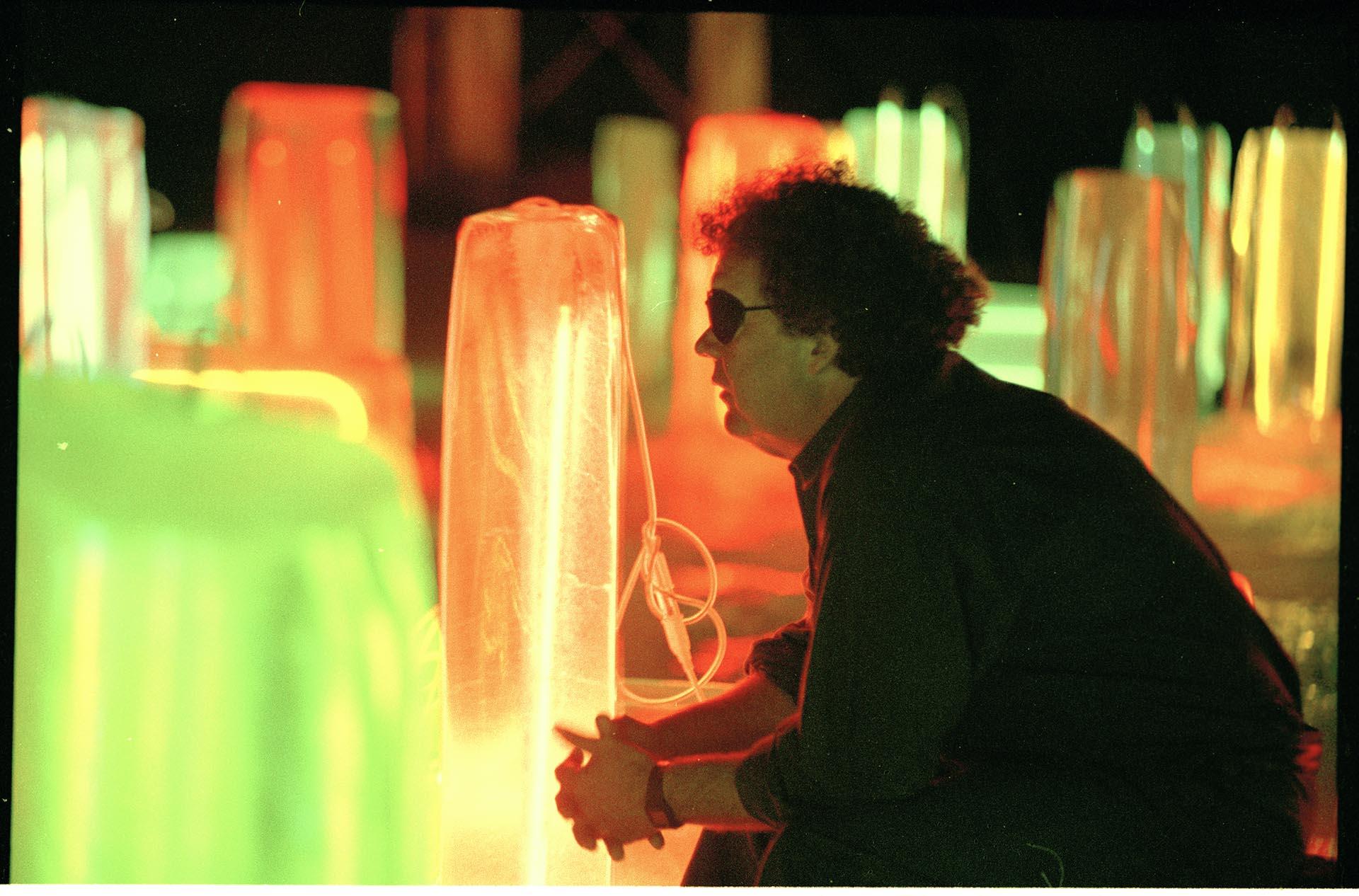 Image of Dale Chihuly with his neon and ice installation at the Tacoma Dome,  September 1, 1993