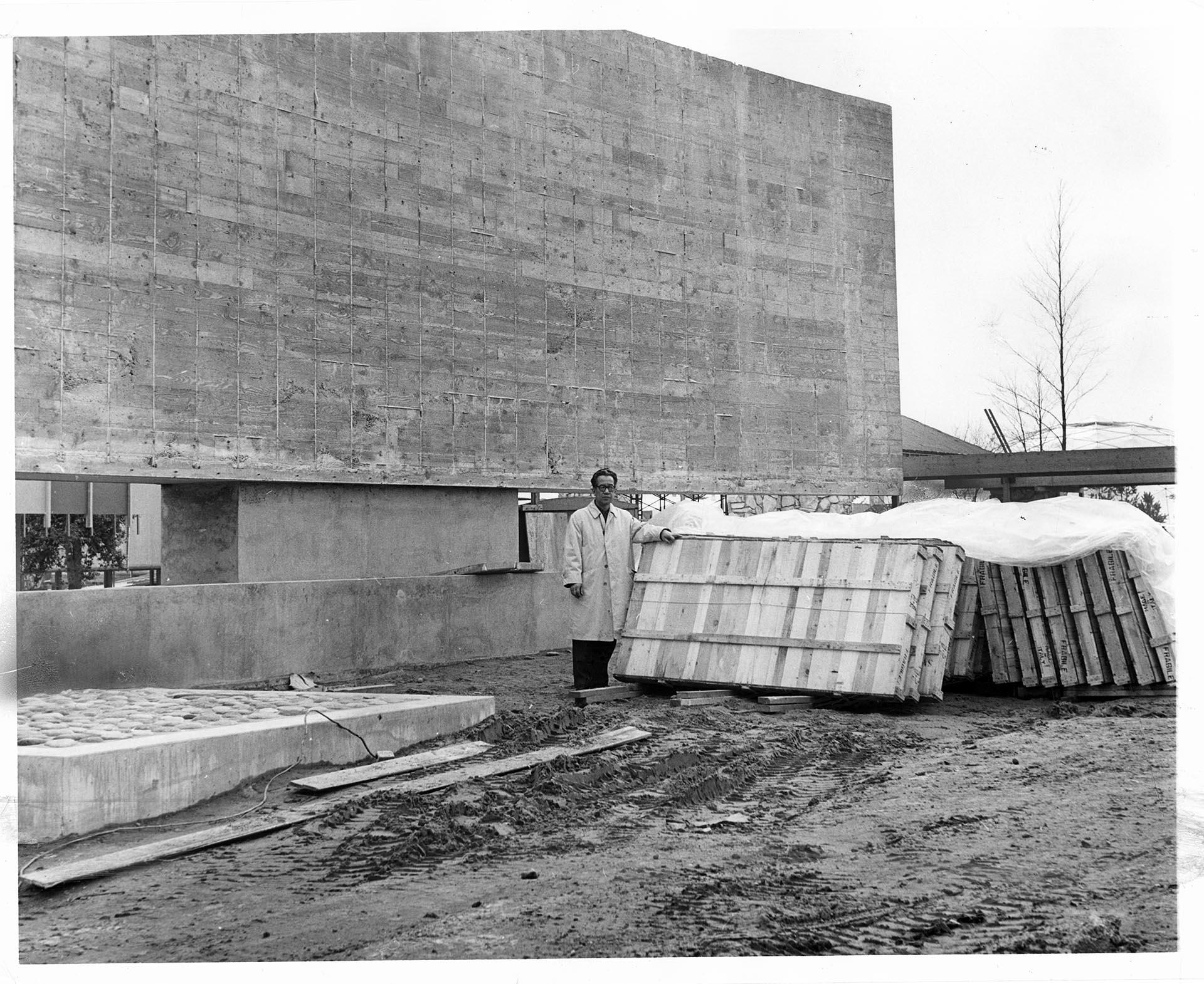 Image of Paul Horiuchi at the Century 21 mural site, Seattle, March 26, 1962