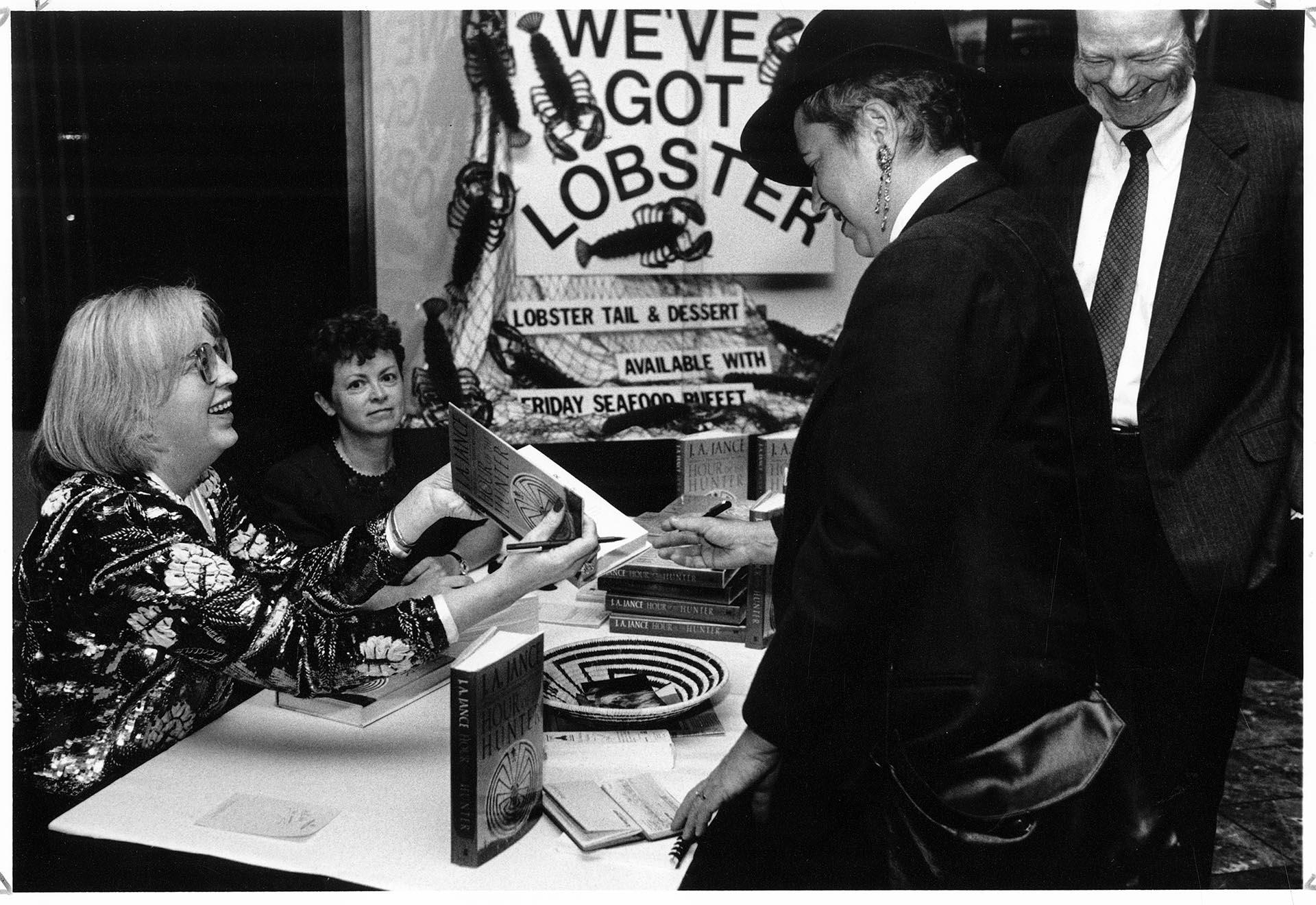 Image of J. A. Jance signing books, Seattle, November 15, 1991