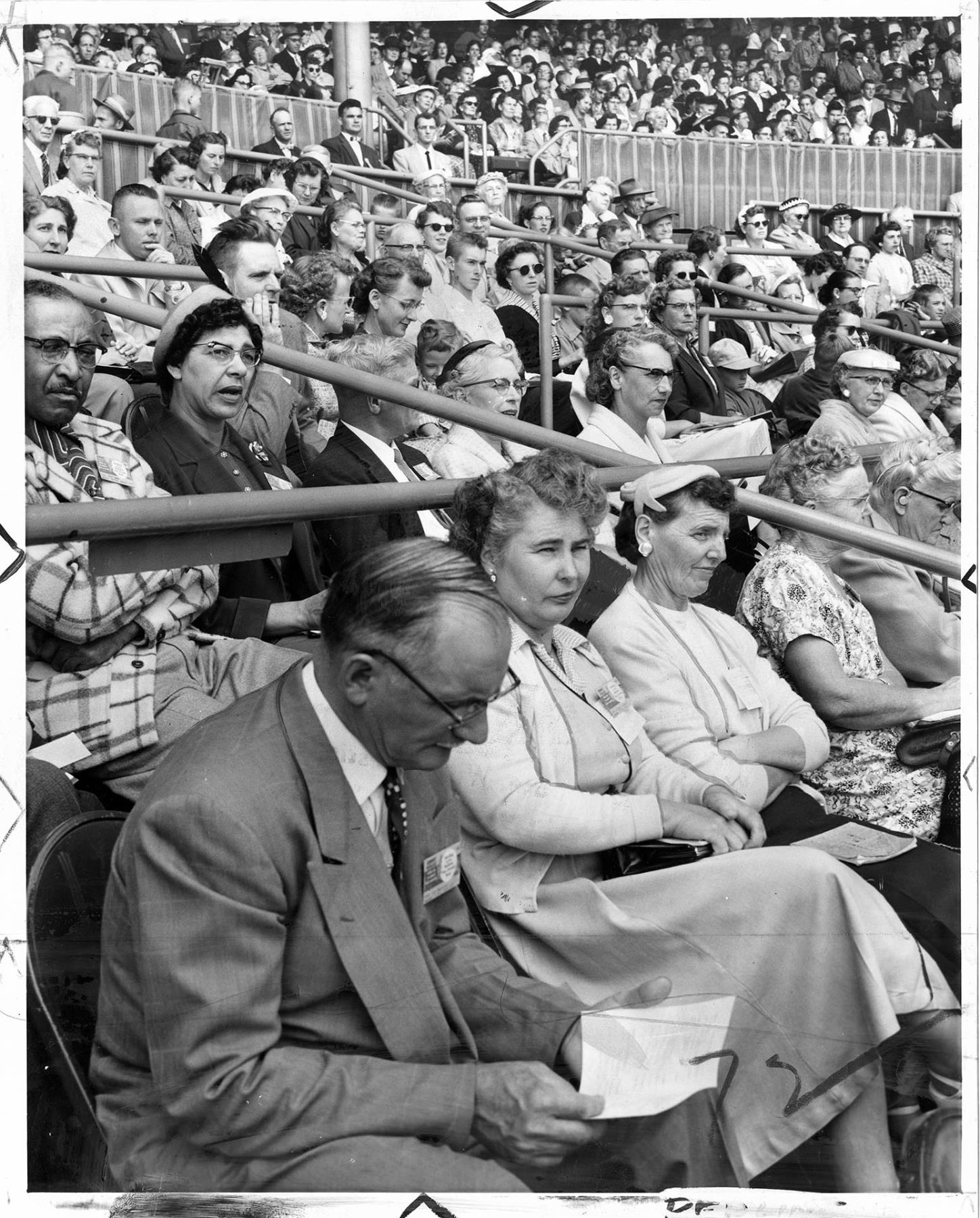 Image of Jehovah's Witnesses in bleachers at Sick's stadium, Seattle, July 10, 1957