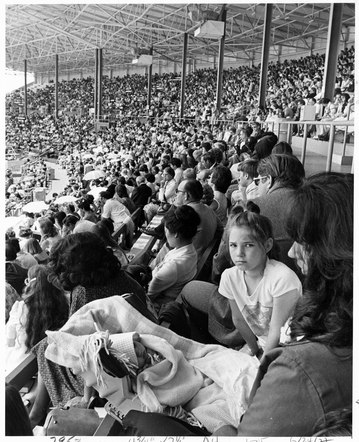 Image of Jehovah's Witnesses in grandstand at convention, Puyallup, June 23, 1977