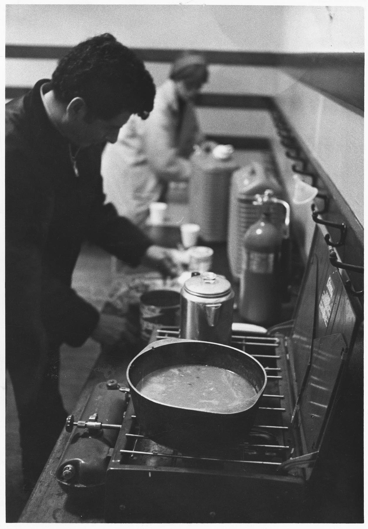 Image of Isidoro Gonzales working in kitchen during occupation of Beacon Hill School, October 18, 1972