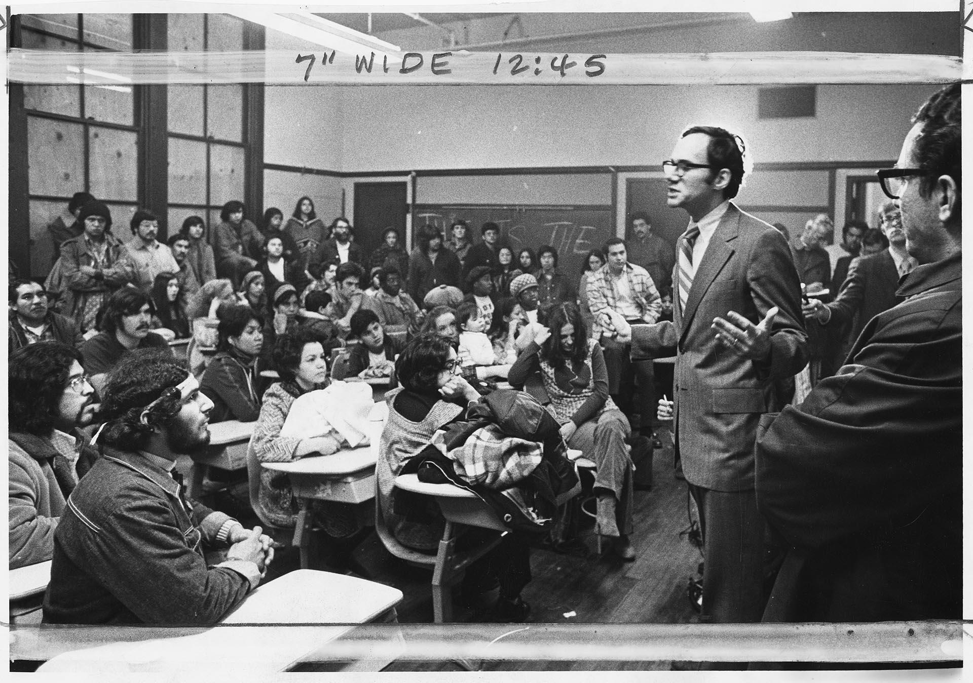 Image of Councilman John Miller speaking to group occupying Beacon Hill School, October 12, 1972