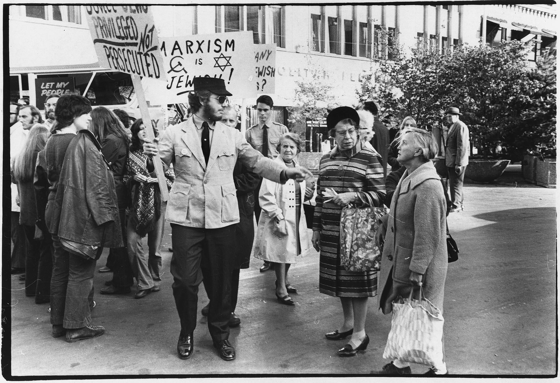 Image of Woman confronting American Nazi Party picketers, Seattle, October 13, 1971