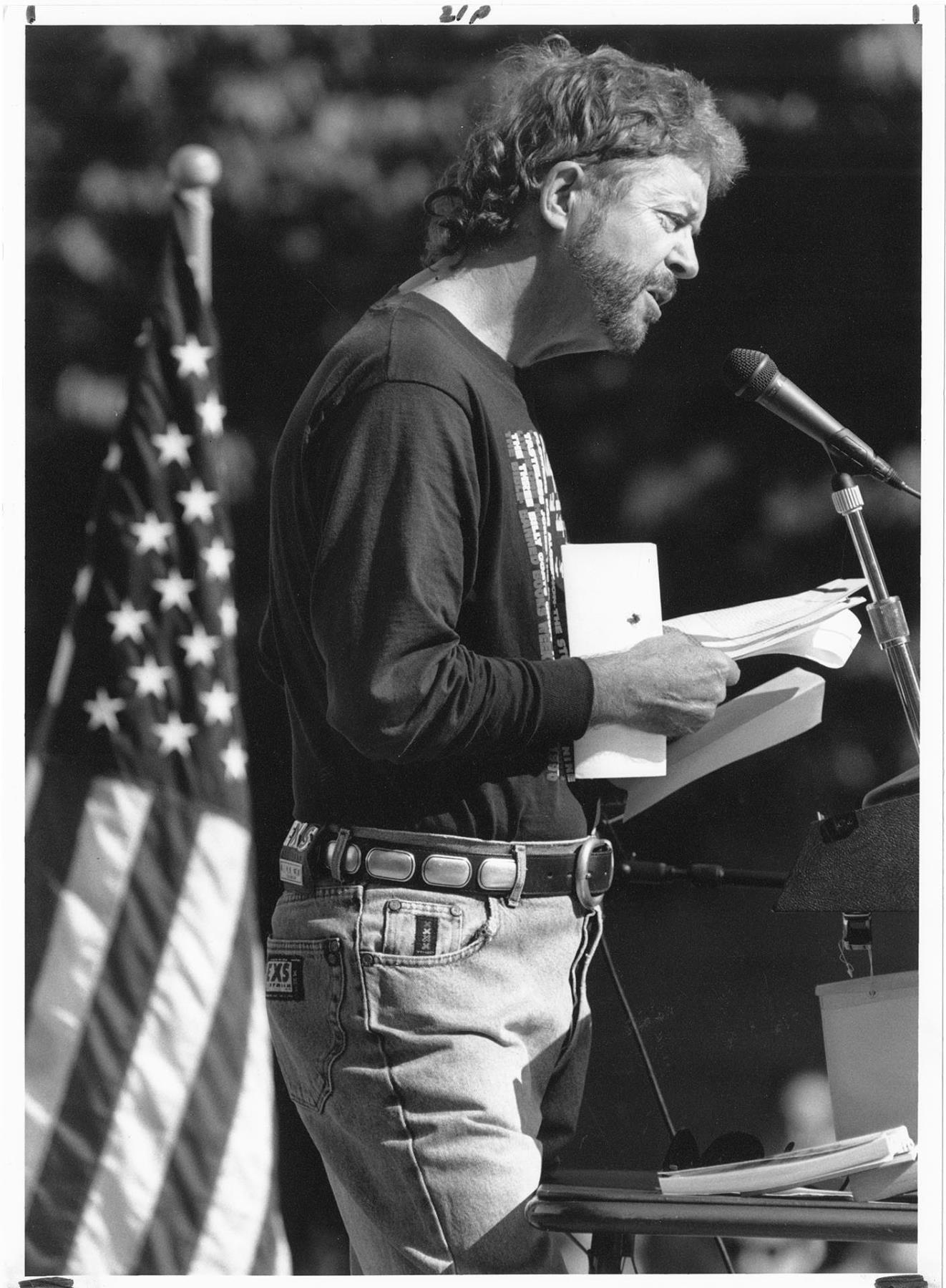Image of Tom Robbins reading at an anti-censorship event, Seattle, October 3, 1991