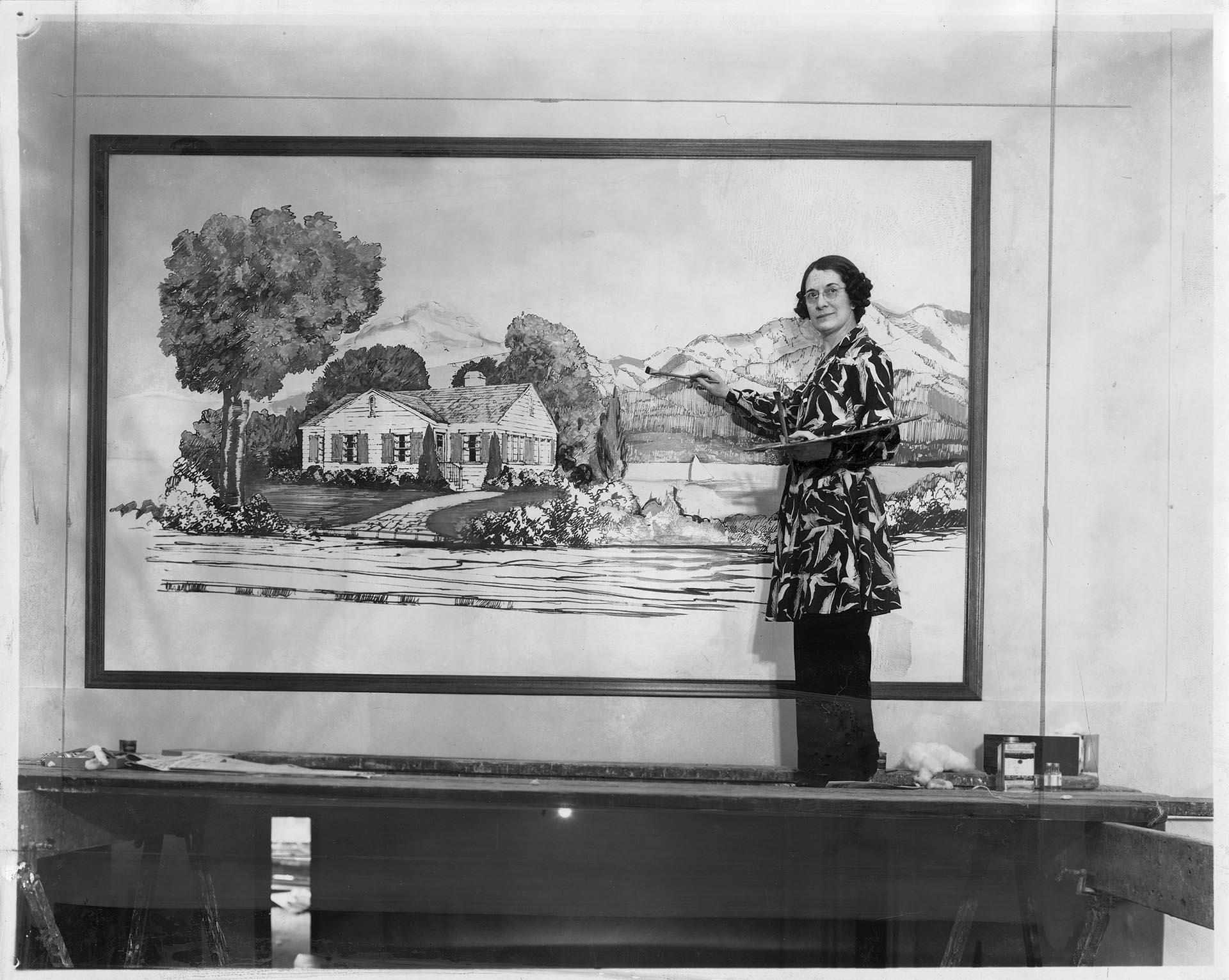 Image of Maude Zerby Strong painting a mural, Seattle, May 5, 1937