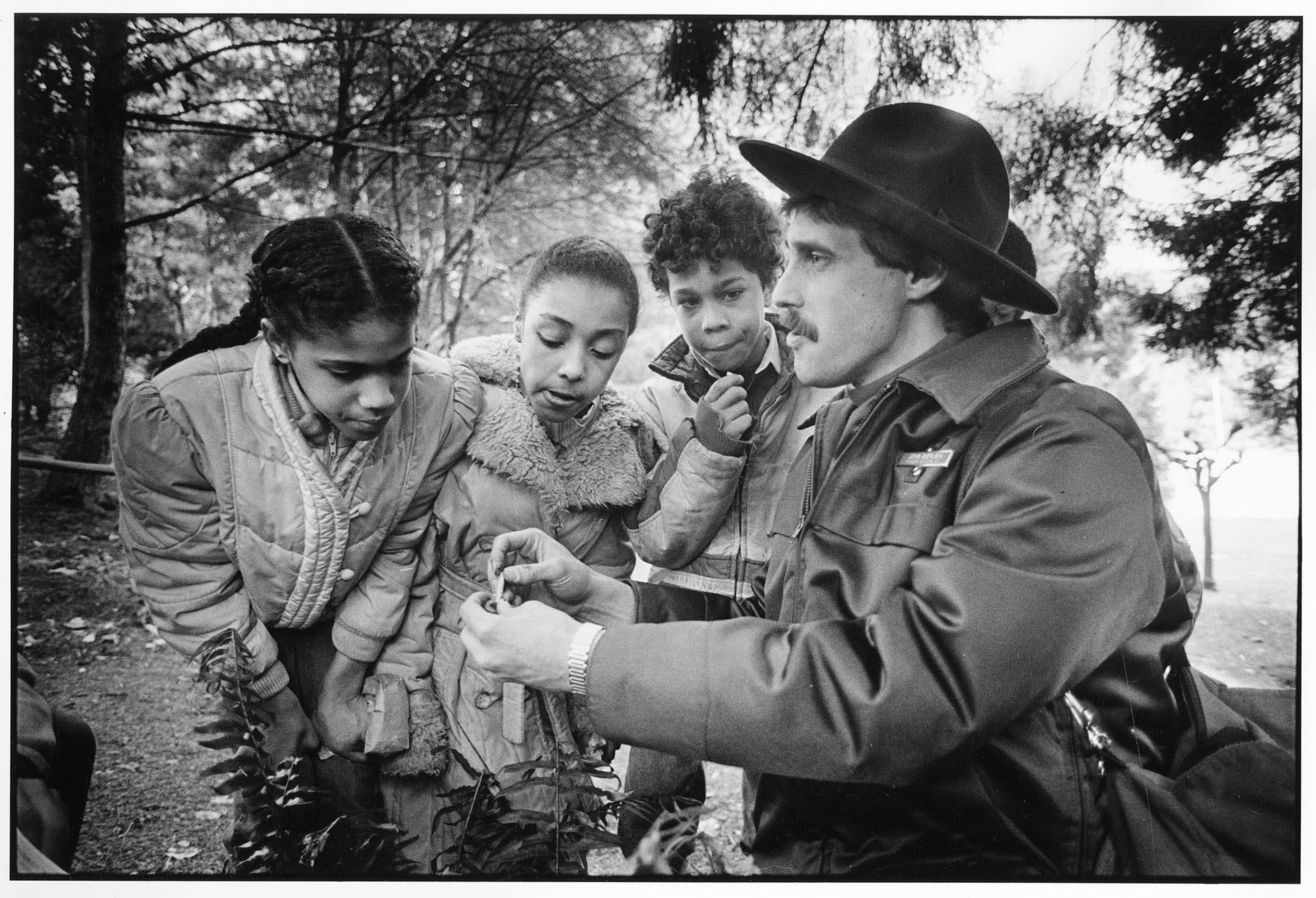 Image of Ranger leading nature walk at Camp Long, Seattle, March 7, 1985