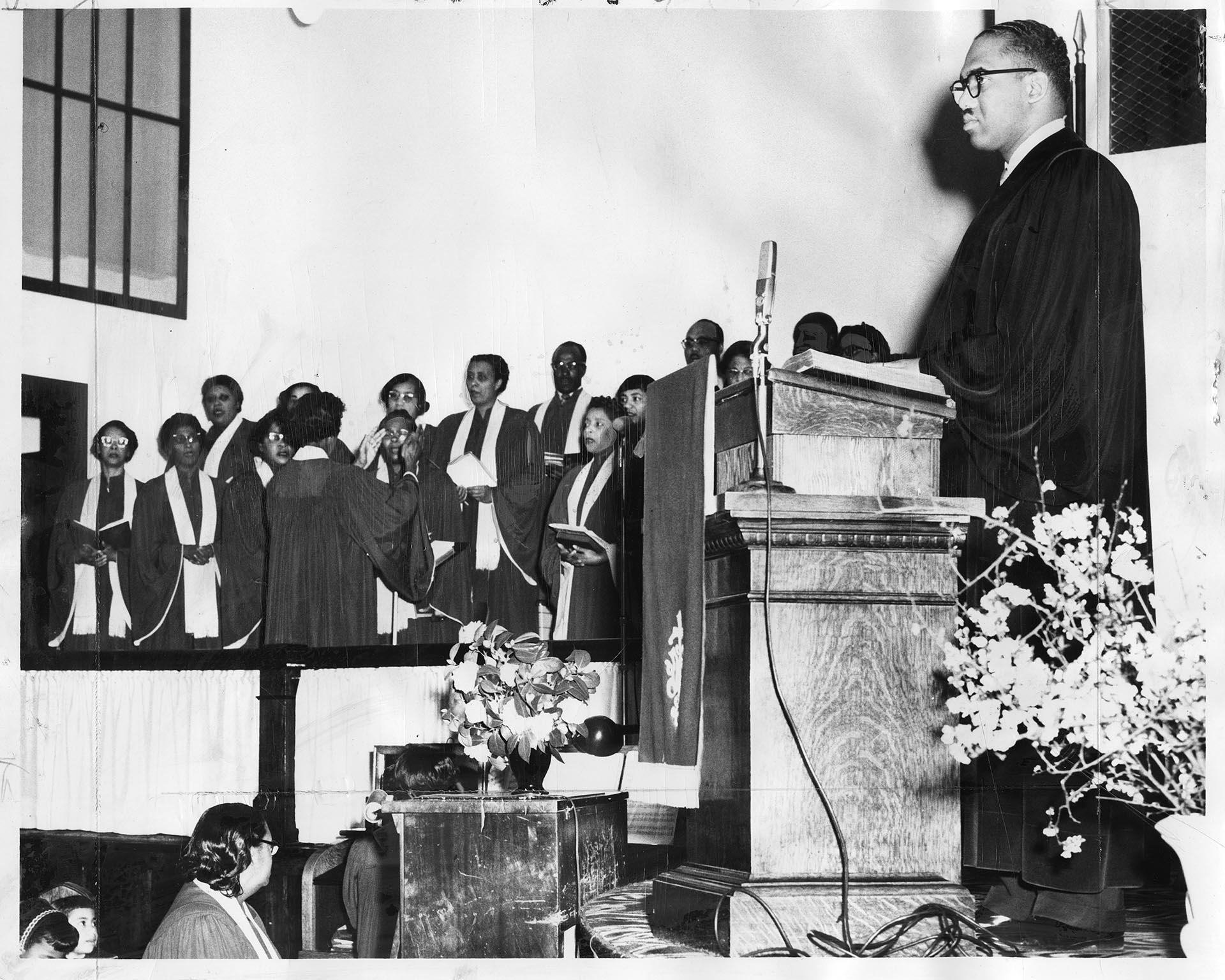 Image of Pastor McKinney listening to choir at Mount Zion Baptist Church, Seattle, March 9, 1958