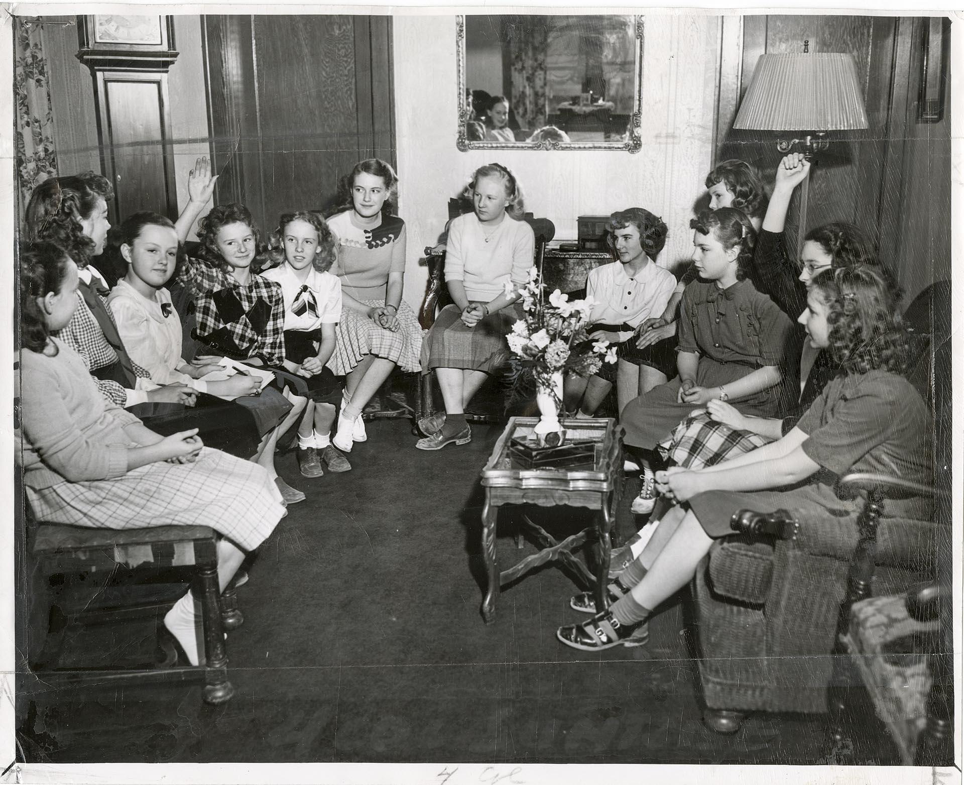 Image of Do Good Club members discussing event, Seattle, February 11, 1948