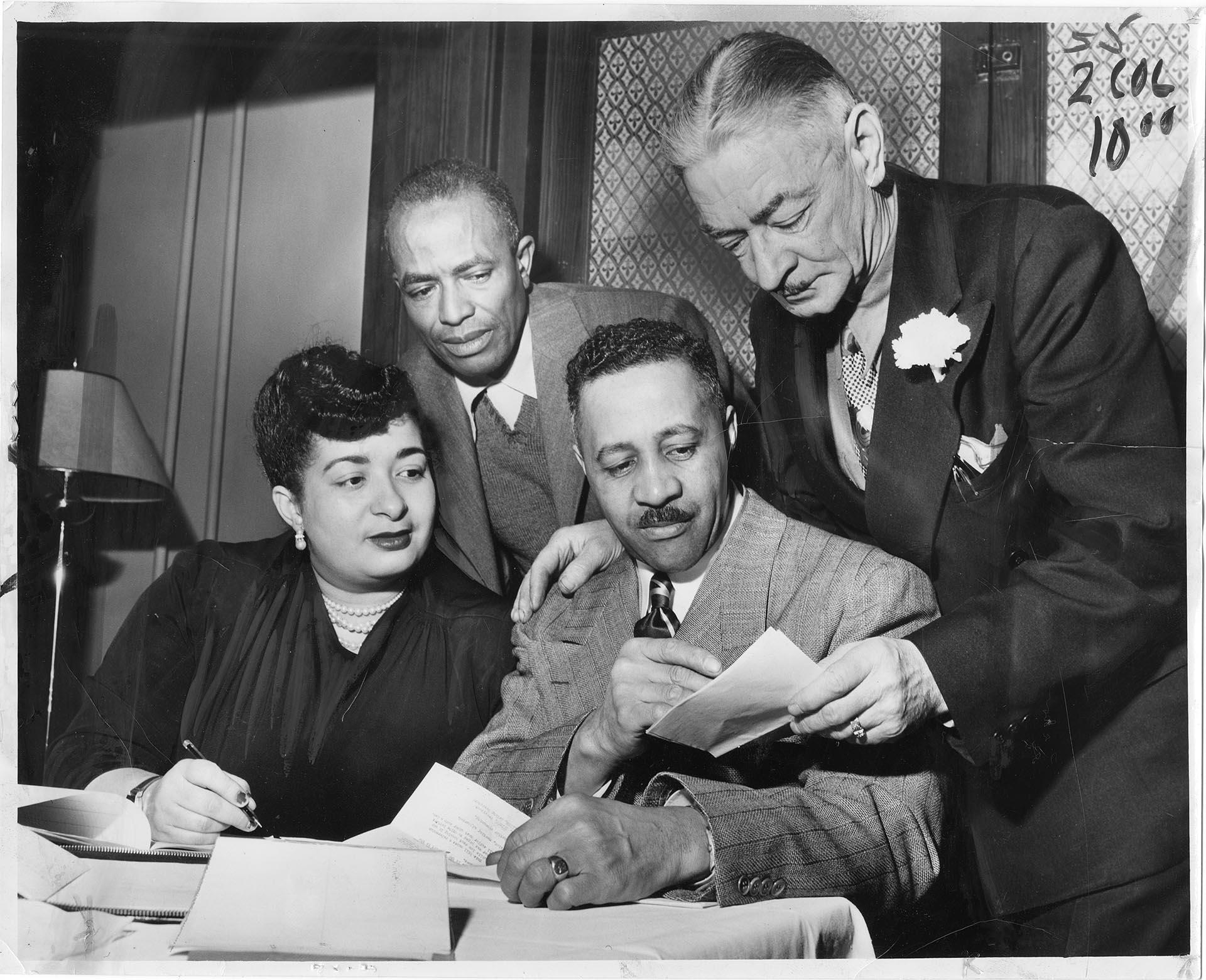 Image of Commercial Club officers discussing projects, Seattle, March 5, 1951