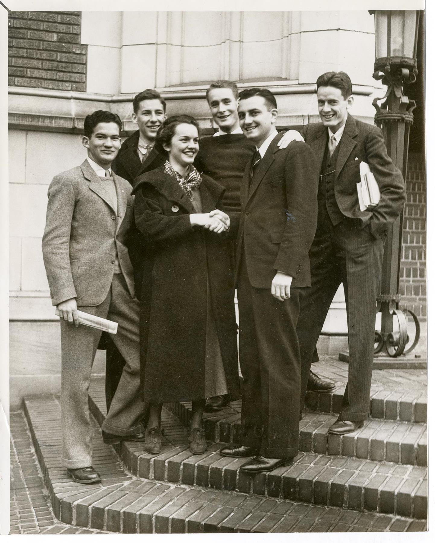 Image of Monks Club members and friend posing on steps, Seattle, November 1935