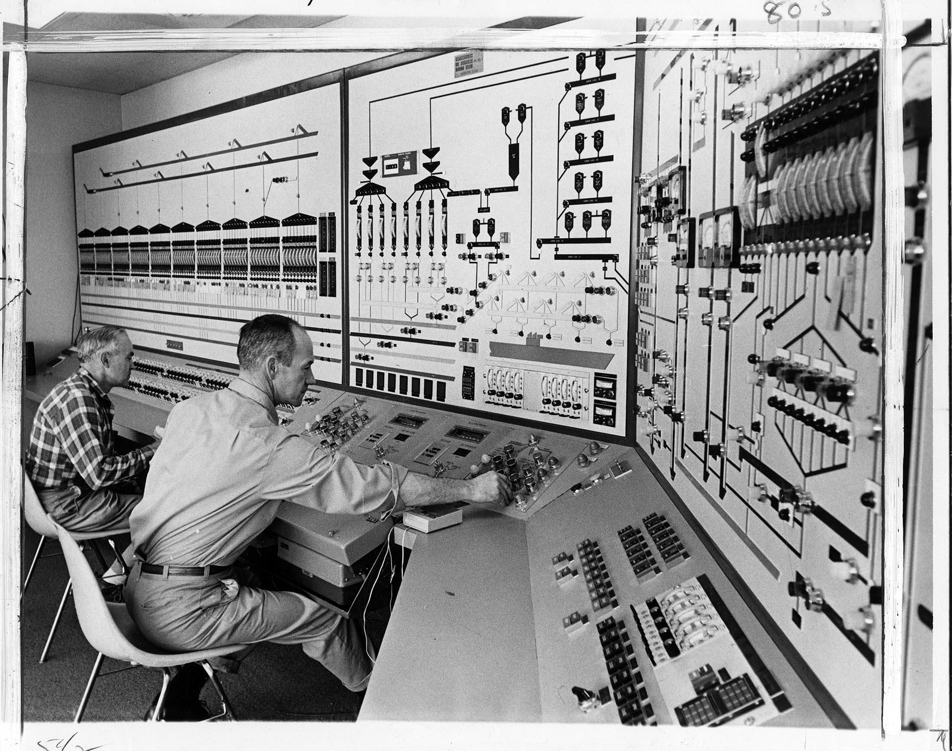 Image of Employees operating Pier 86 grain terminal control panel, Seattle, October 28, 1970