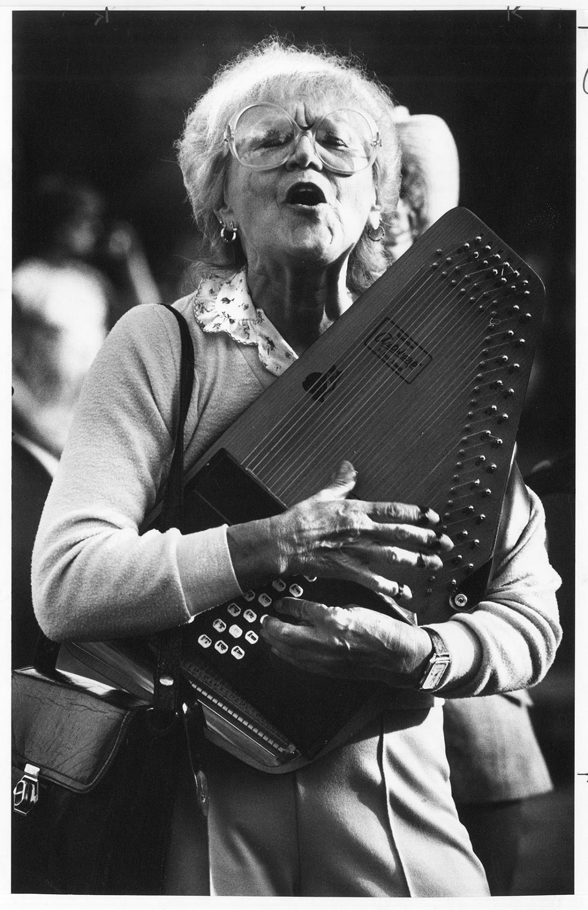 Image of Woman singing at Folklife Festival, Seattle Center, May 25, 1984