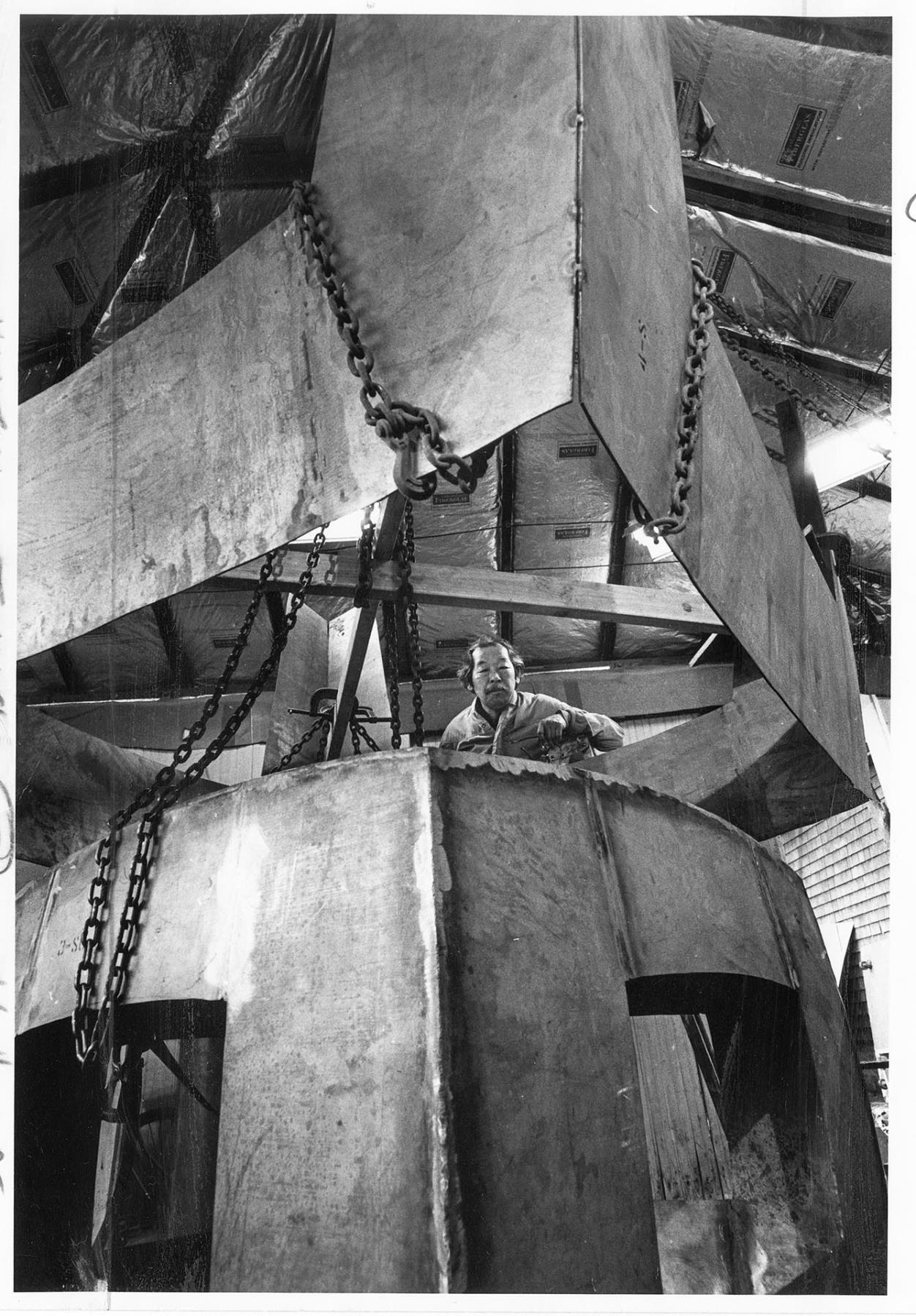 Image of George Tsutakawa creating large metal sculpture, Seattle, February 27, 1972