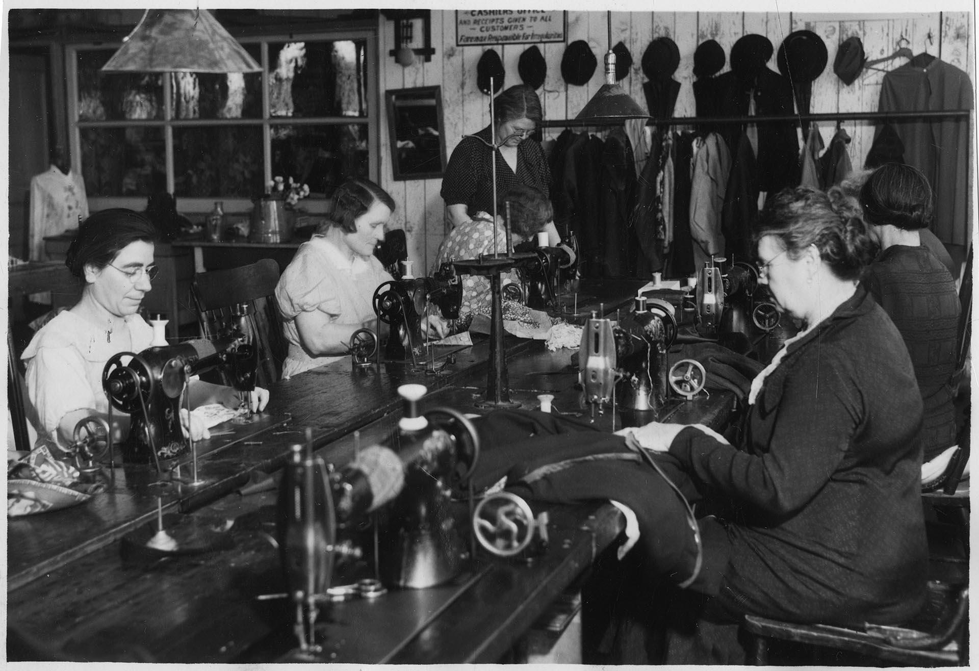 Image of Seamstresses mending garments at Goodwill, Seattle, November 21, 1934