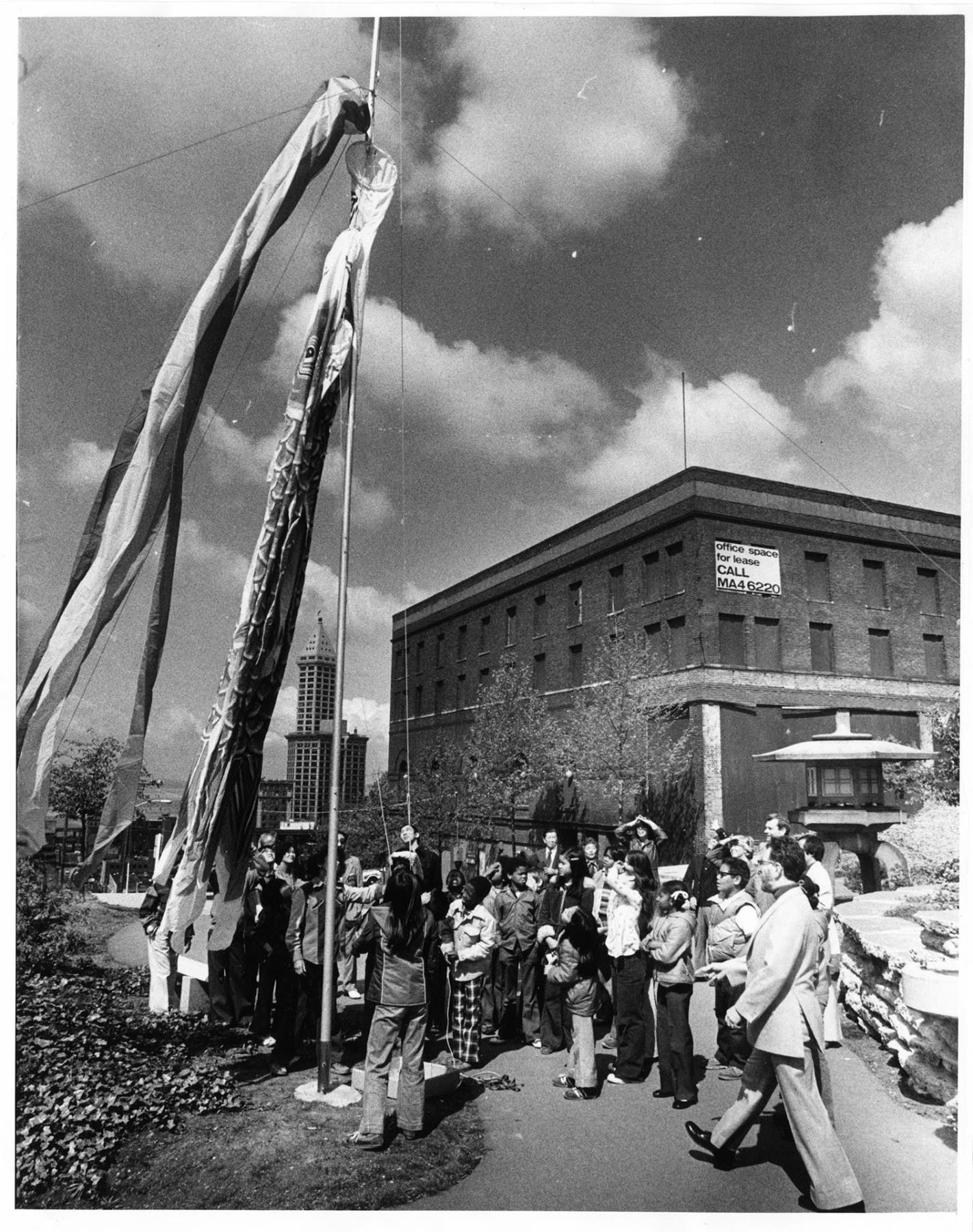 Image of Group watching the raising of the koinobori on Children's Day, Seattle, May 5, 1978