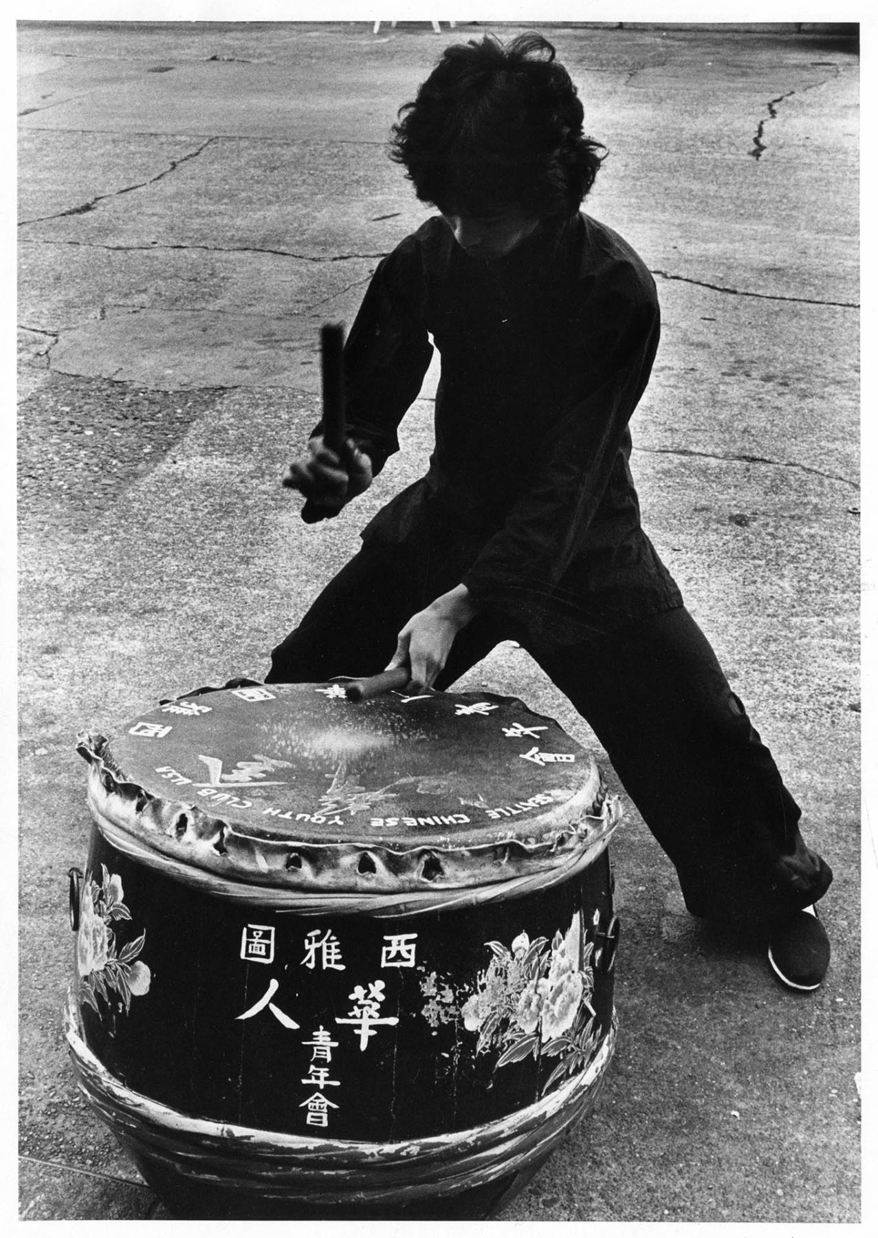 Image of Youth playing Chinese drum, Seattle, October 10, 1980