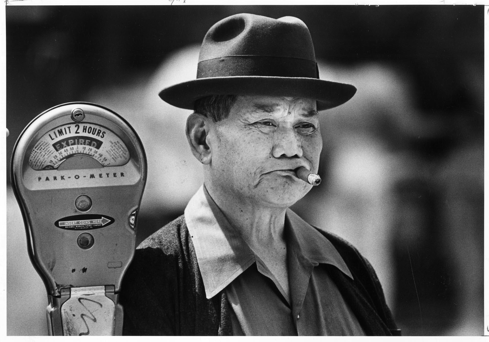 Image of Gil Go watching Chinatown - International District festival performance, Seattle, June 28, 1981