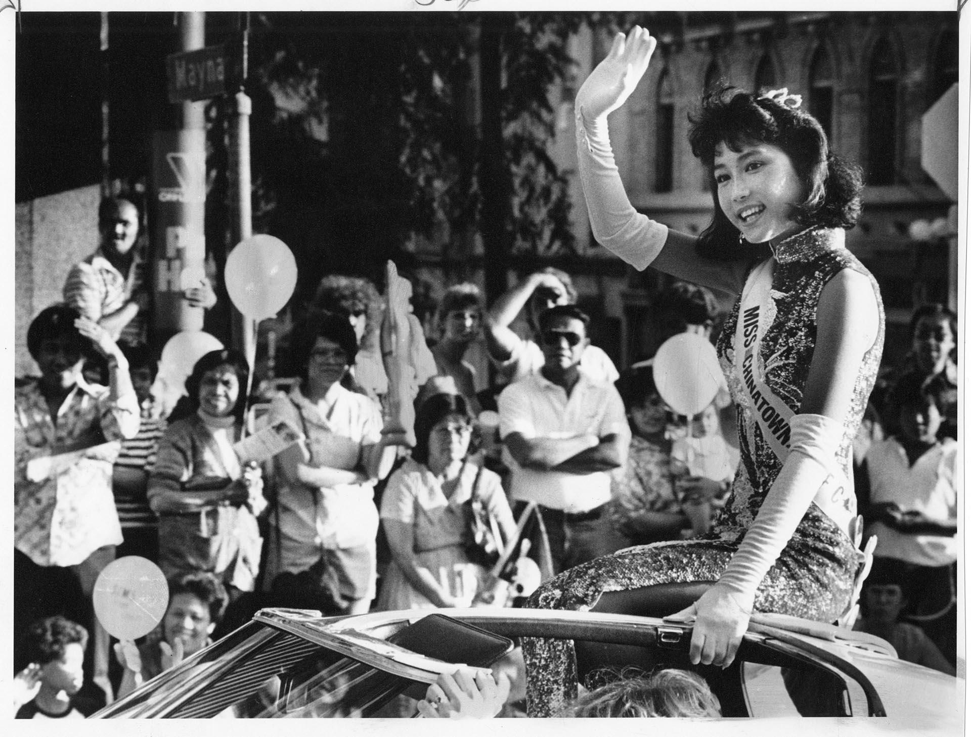 Image of Miss Chinatown waving from Summer Festival parade car, Seattle, July 28, 1985