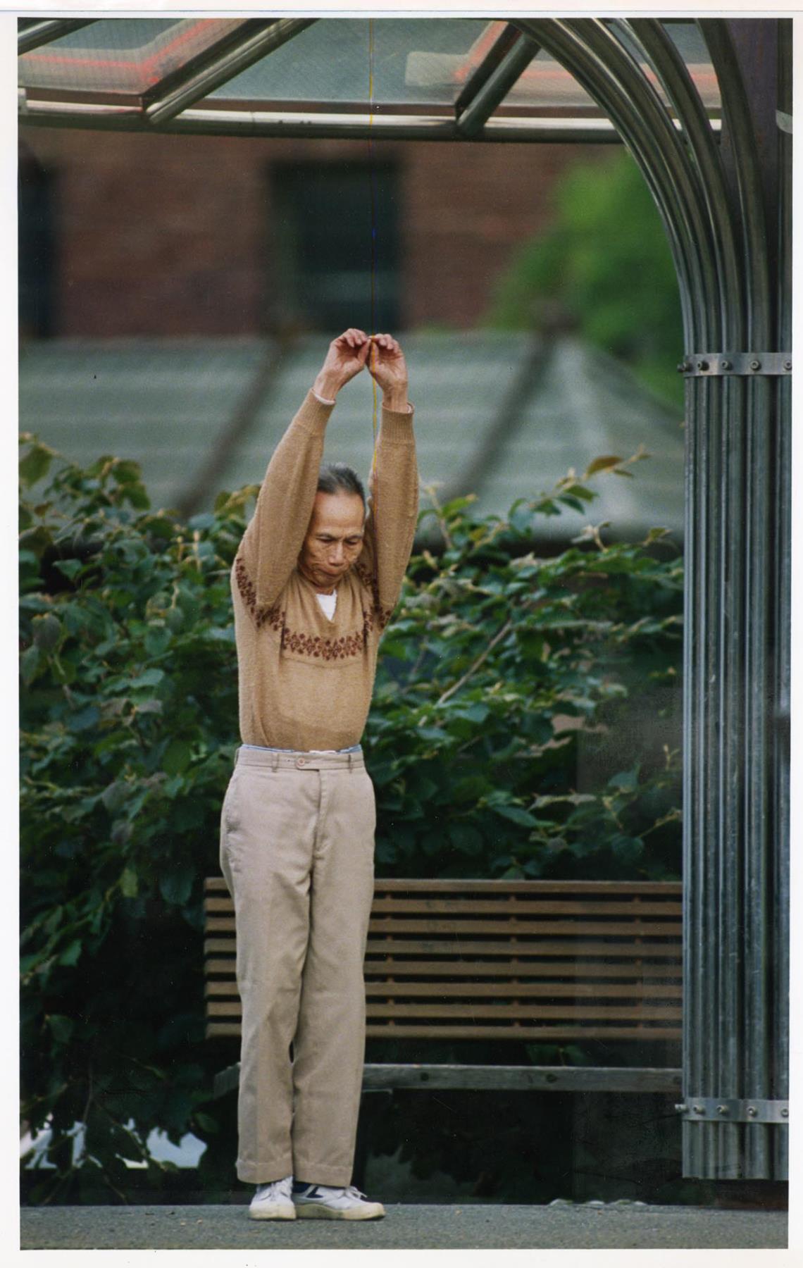 Image of Man practicing tai chi in International Children's Park, Seattle, July 6, 1986