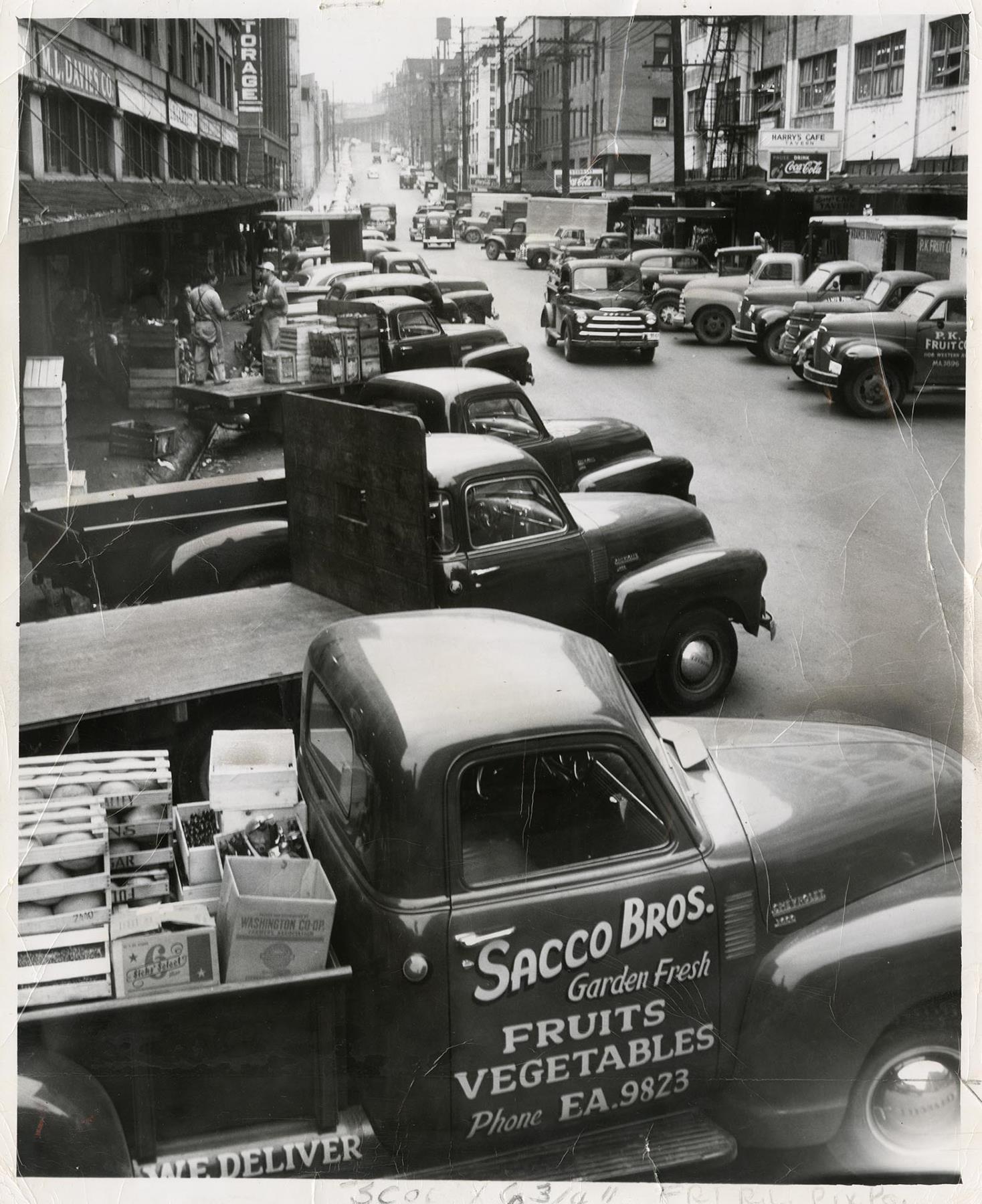 Image of Food merchants receiving goods, Seattle, July 28, 1950