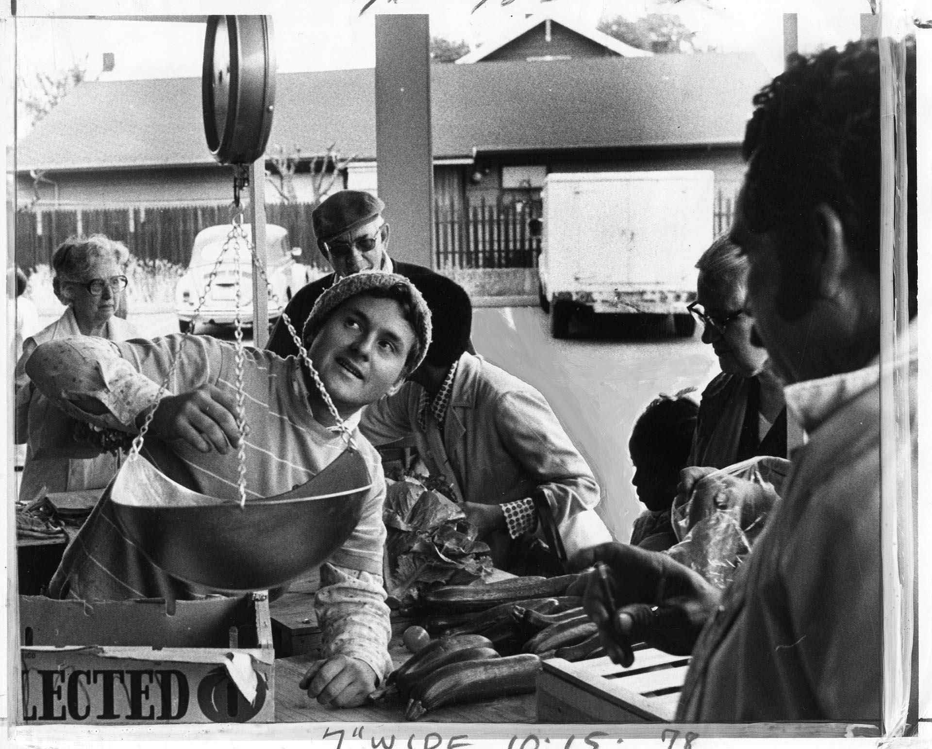 Image of Joe Torlai selling produce at Inner City Market, Seattle, August 2, 1975