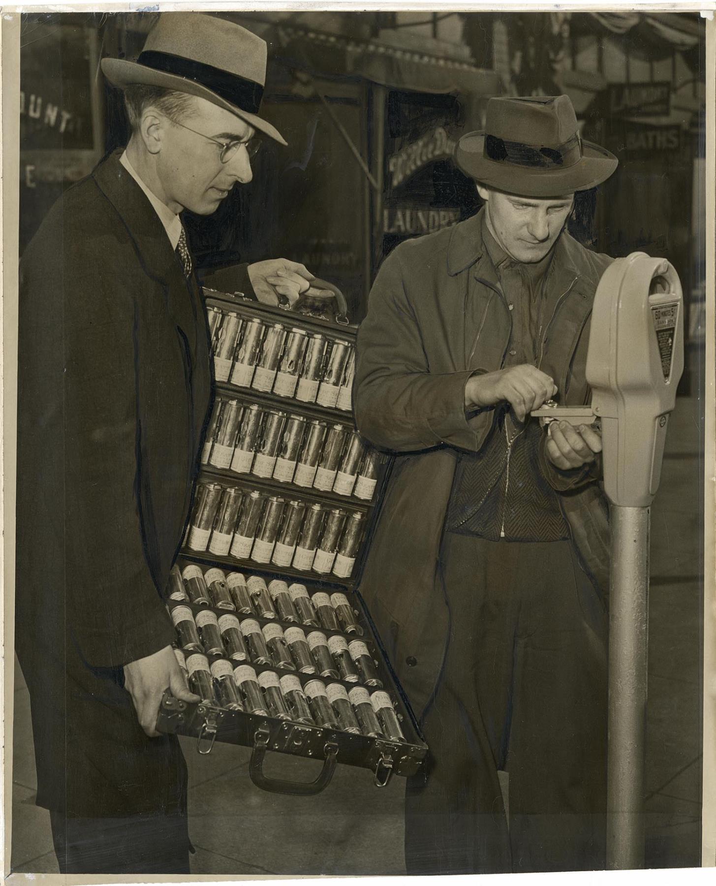 Image of City employees collecting money from parking meters, Seattle, February 7, 1942