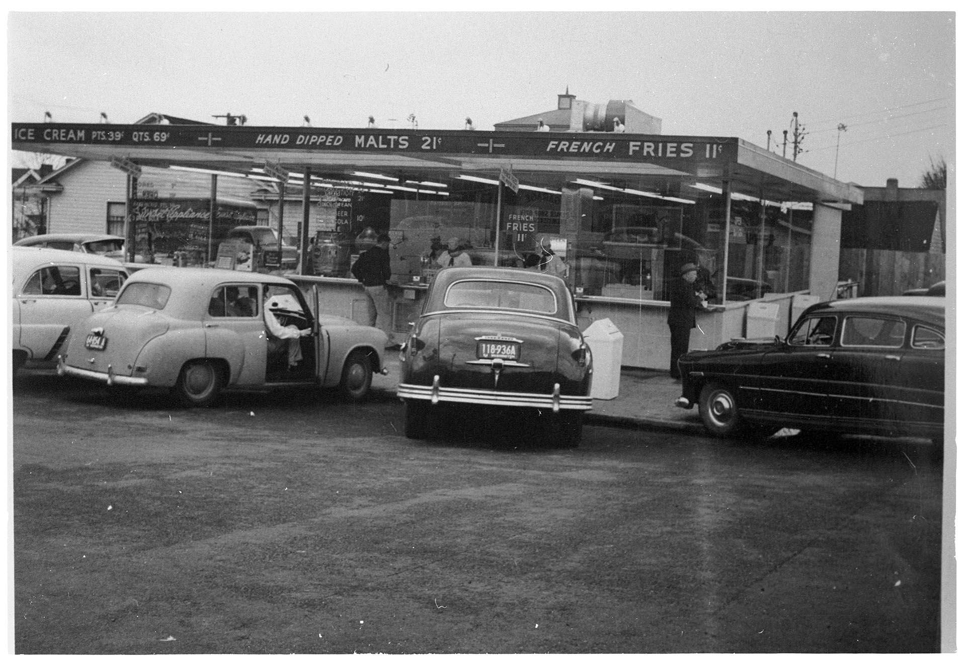 Image of Customer ordering at Dick's Drive-In Restaurant, Seattle, circa 1955