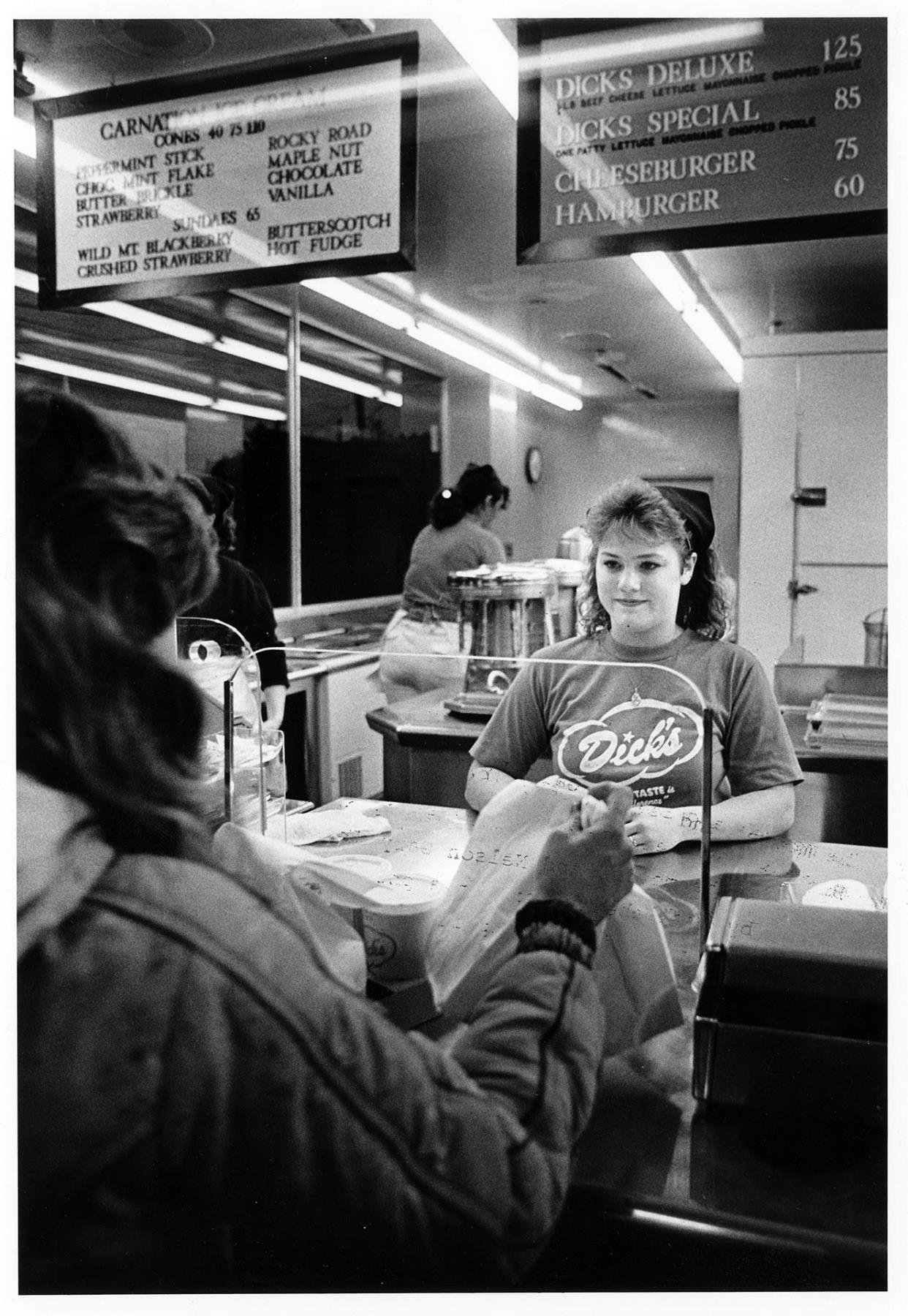 Image of Debbie Dahms working at Dick's Drive-In, Seattle, March 25, 1986