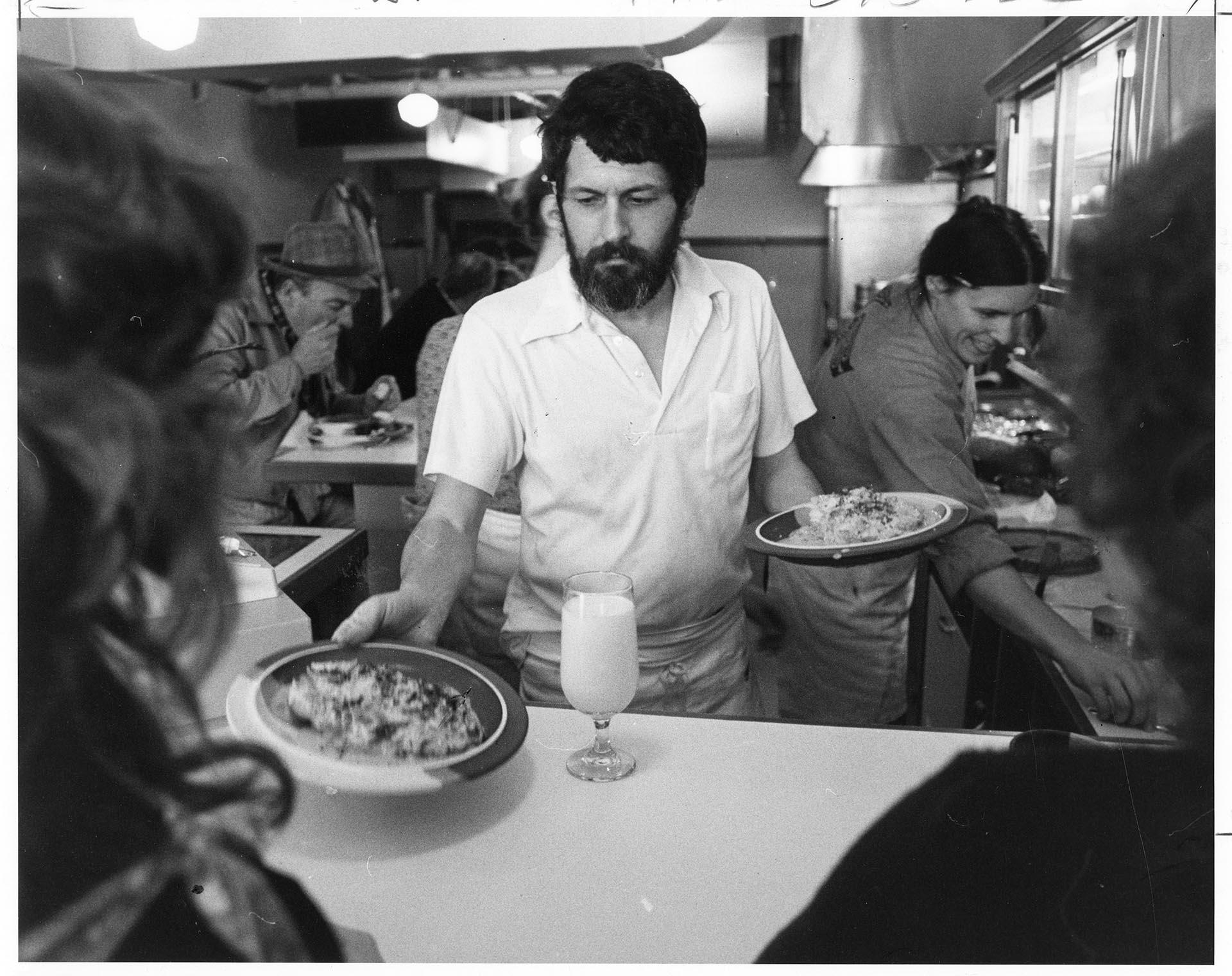 Image of Staff serving lunch at the Market Café, Seattle, January 27, 1982