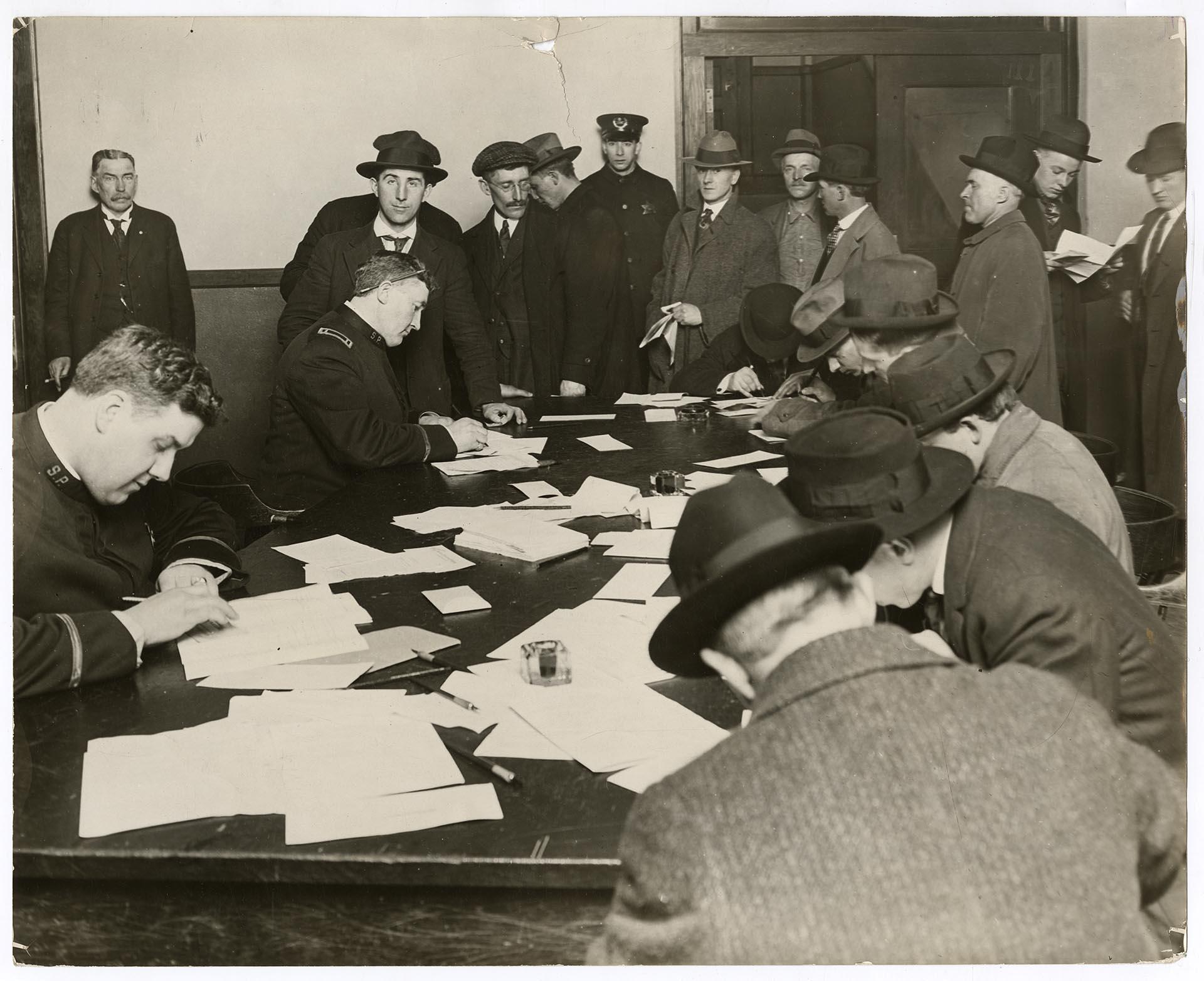 Image of Men registering as 