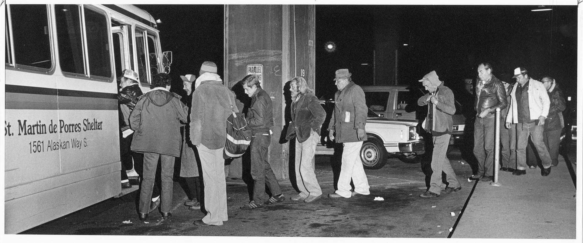 Image of Men boarding bus to homeless shelter, Seattle, November 11, 1985