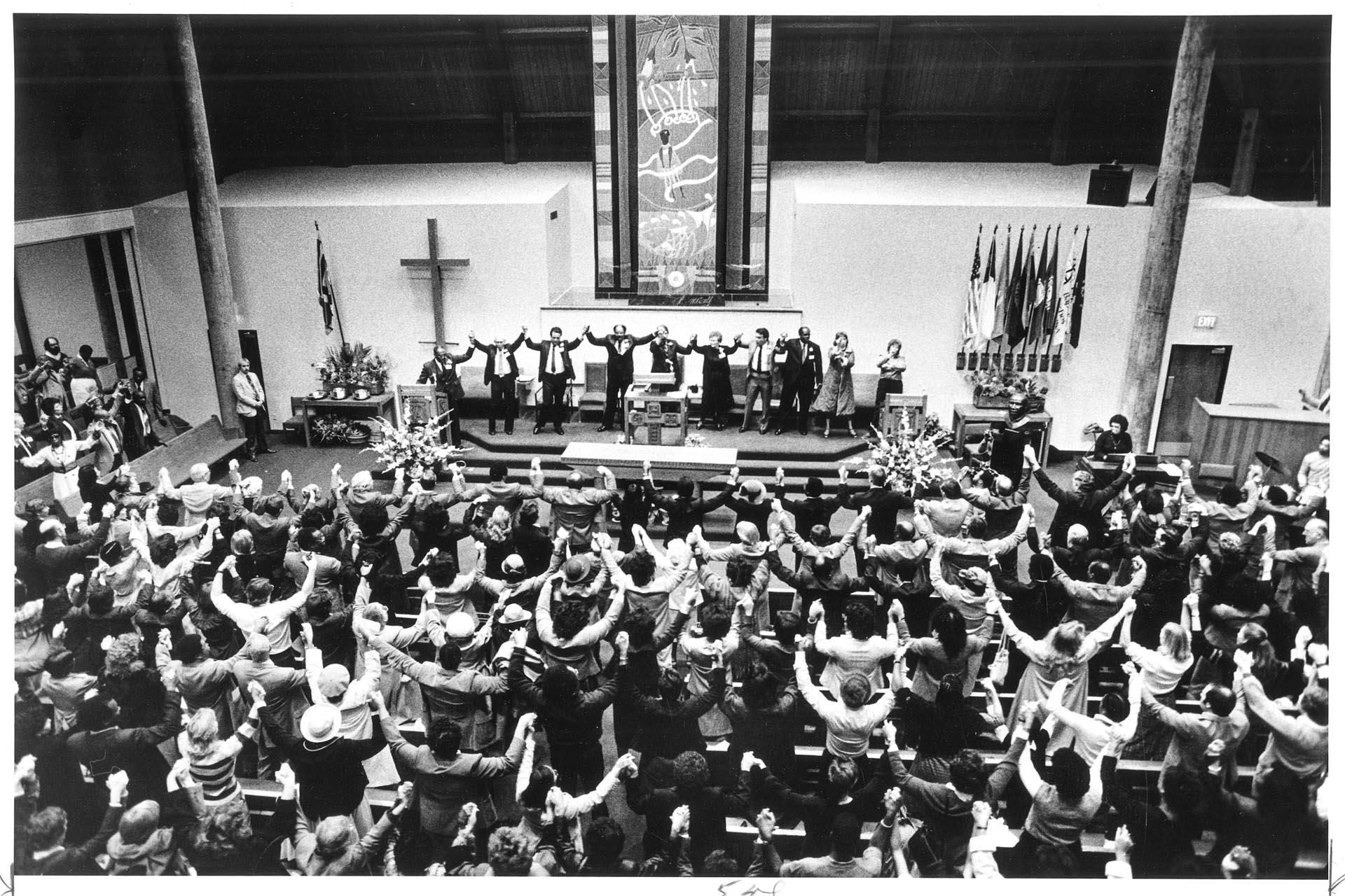 Image of Participants sing at service honoring Martin Luther King, Jr., Seattle, January 15, 1985