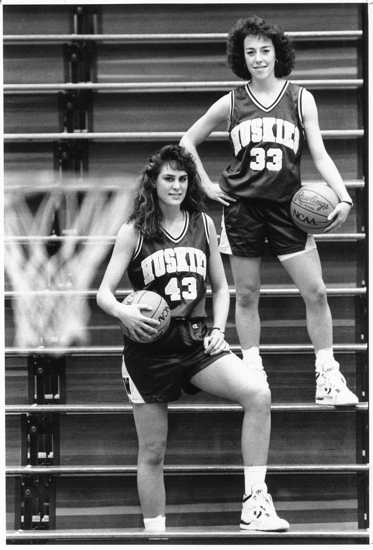 Image of UW women basketball players posing on bleachers, Seattle, March 14, 1991
