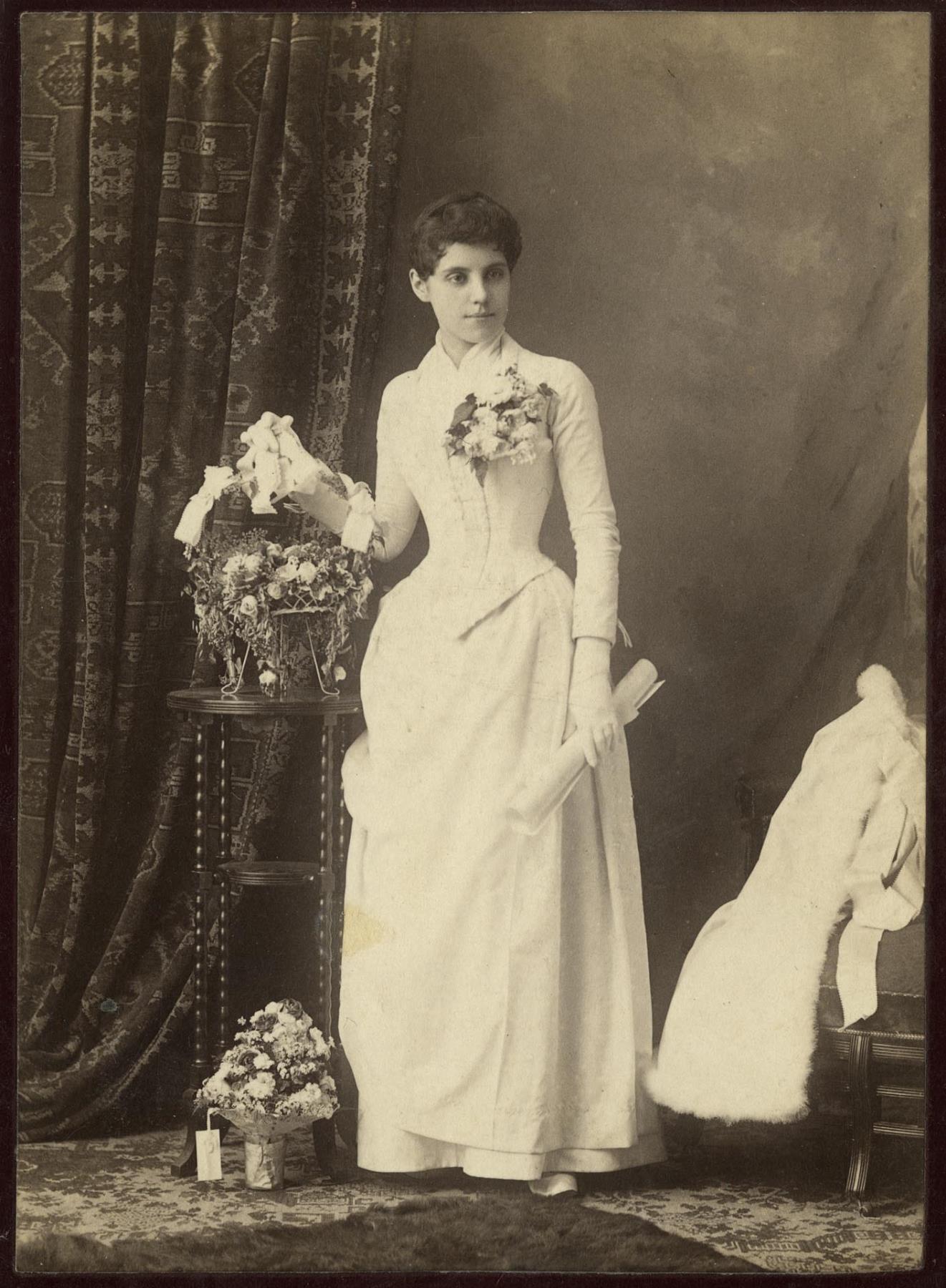 Image of Rebecca Gaines posing for graduation portrait, Seattle, June 7, 1888