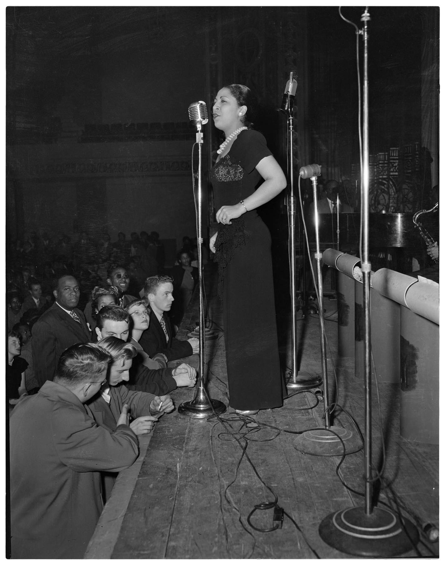 Image of Woman singing with Count Basie orchestra, November 27, 1947
