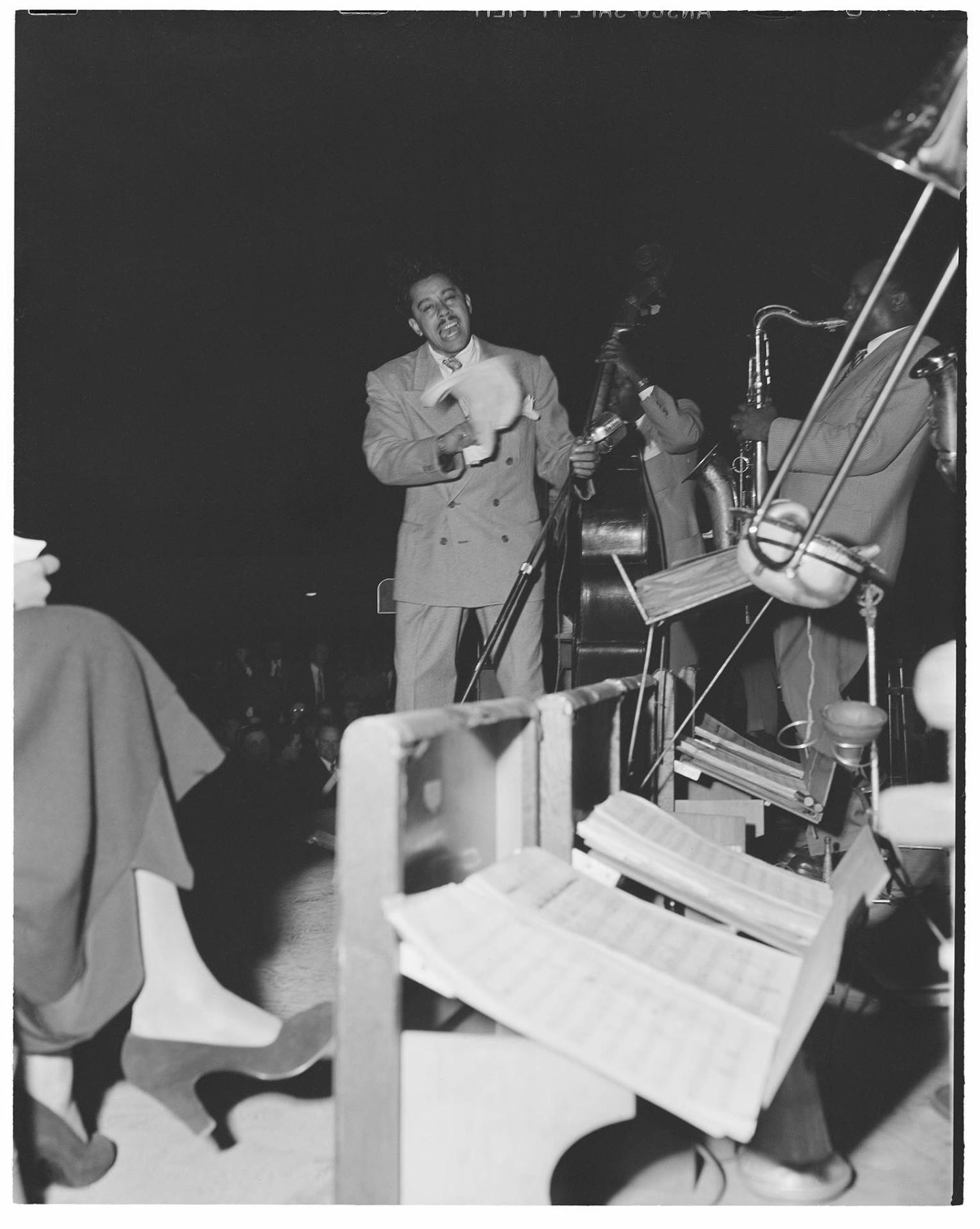 Image of Cab Calloway singing on stage at the Civic Auditorium, Seattle,  circa 1947