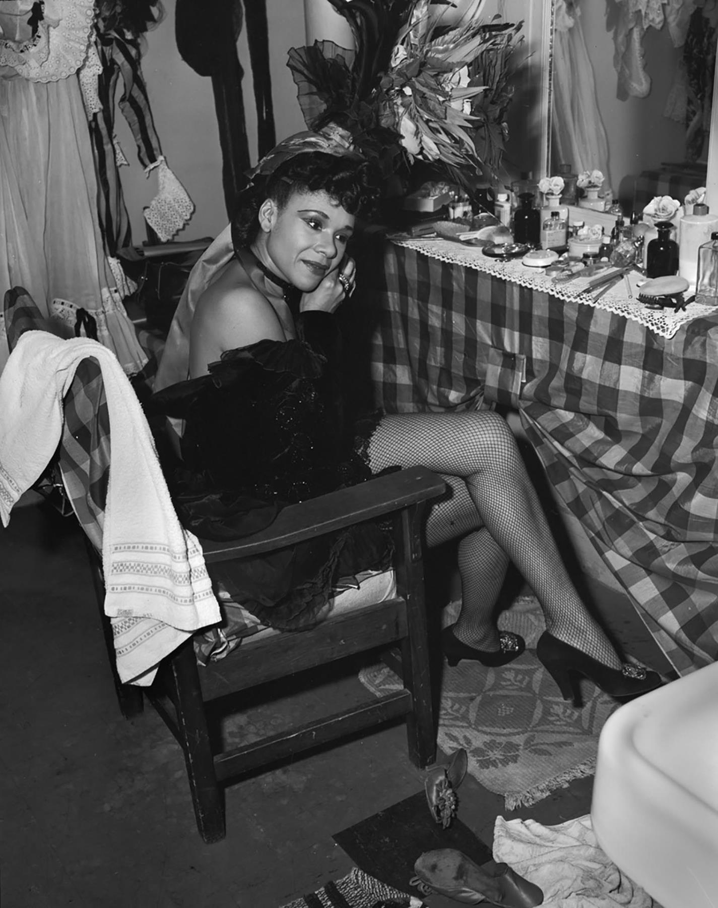 Image of Katherine Dunham sitting in dressing room, Seattle, February 1, 1948