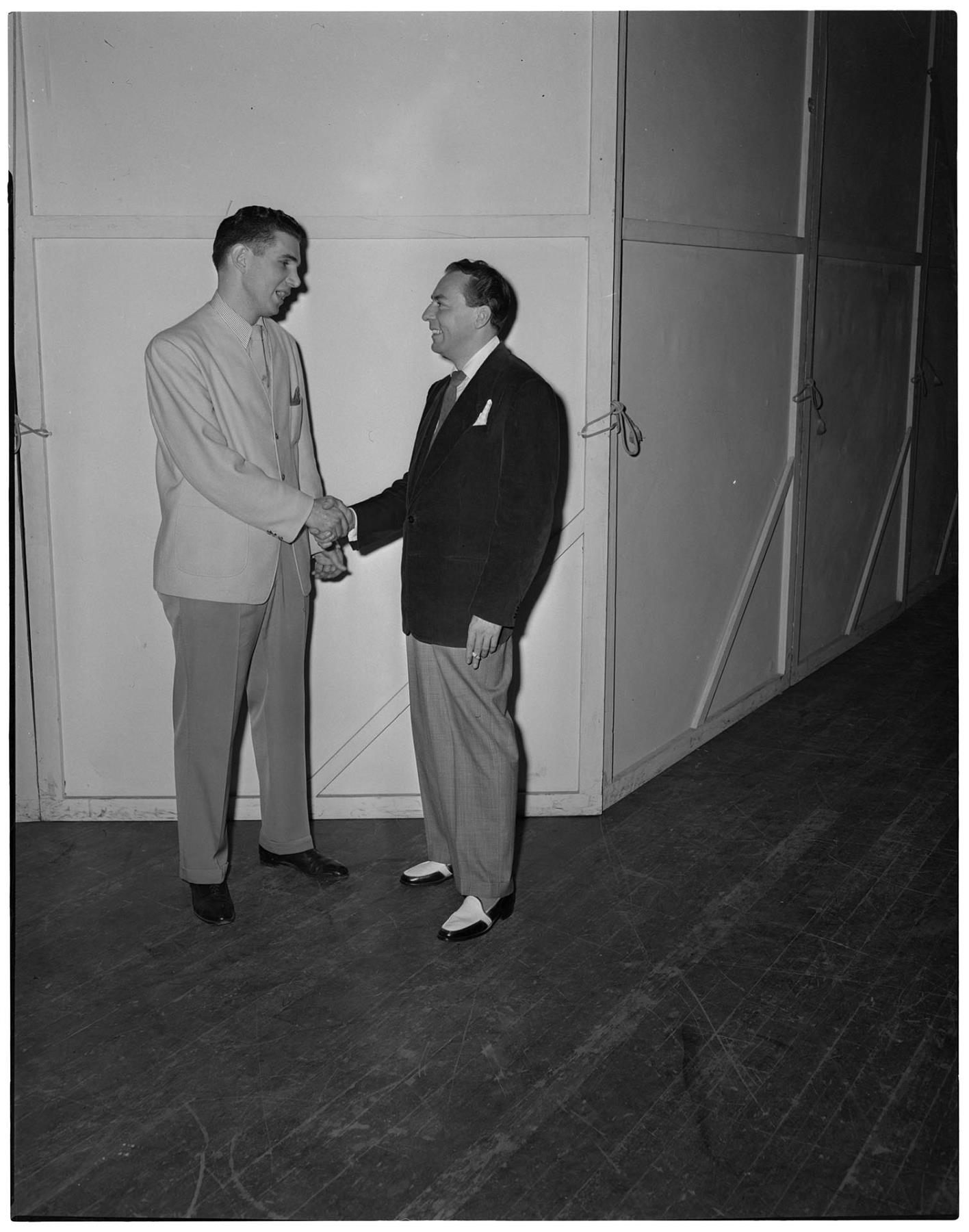 Image of Woody Herman shaking hands with man at Civic Auditorium, Seattle, November 7, 1947
