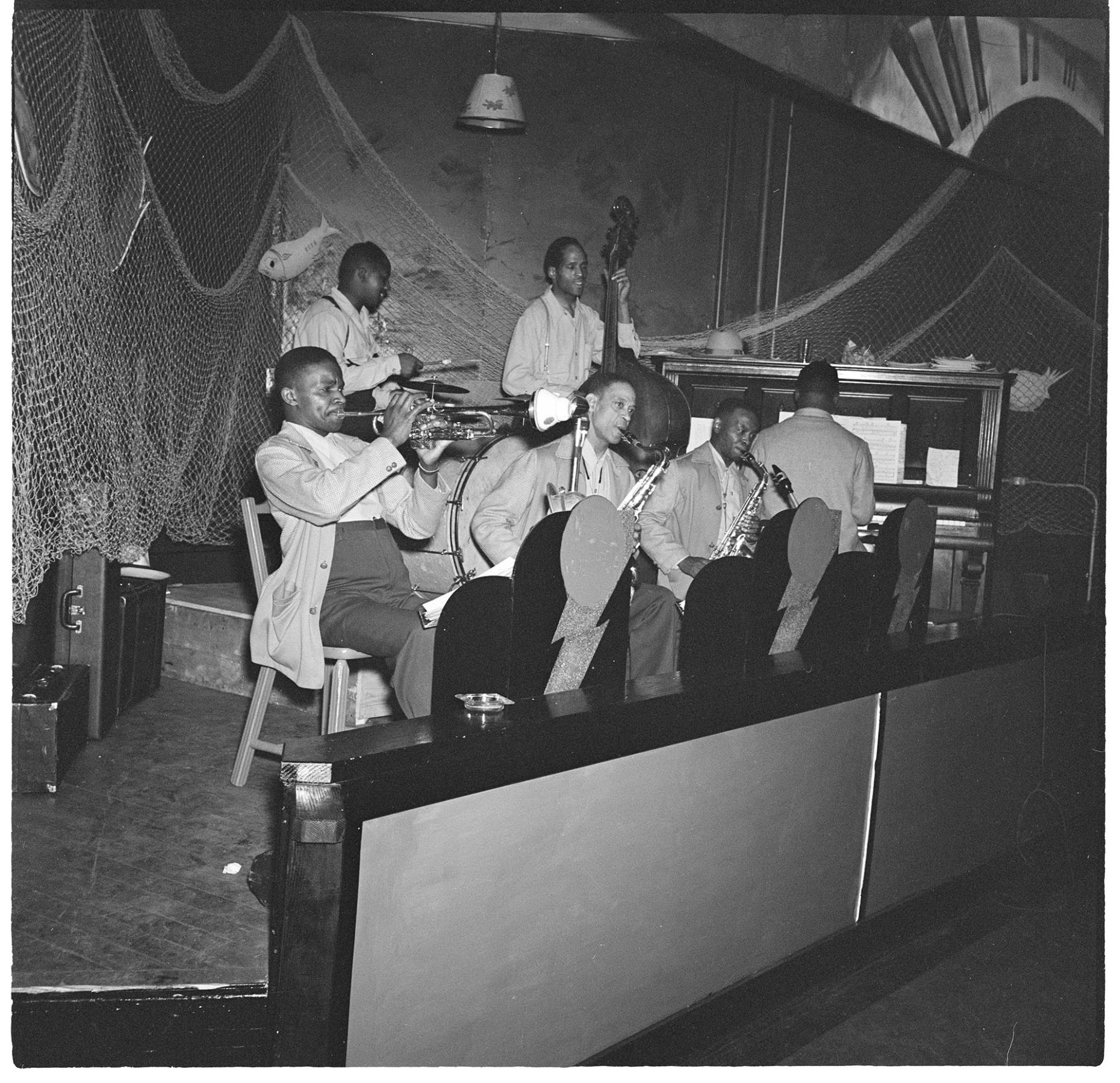Image of Gerald Wells playing saxophone, Seattle, June 22, 1944