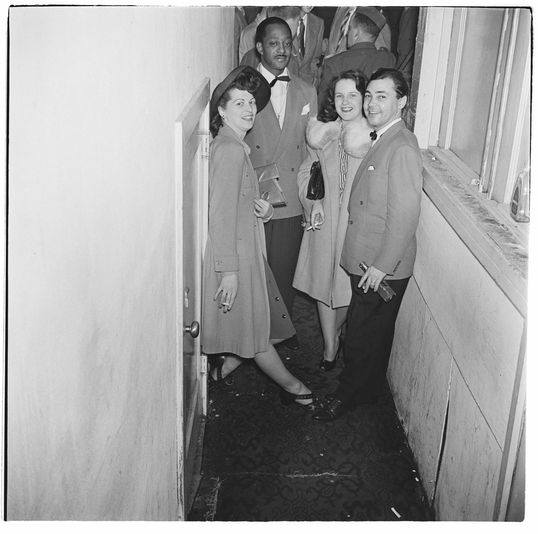 Image of People in a hallway, circa 1947