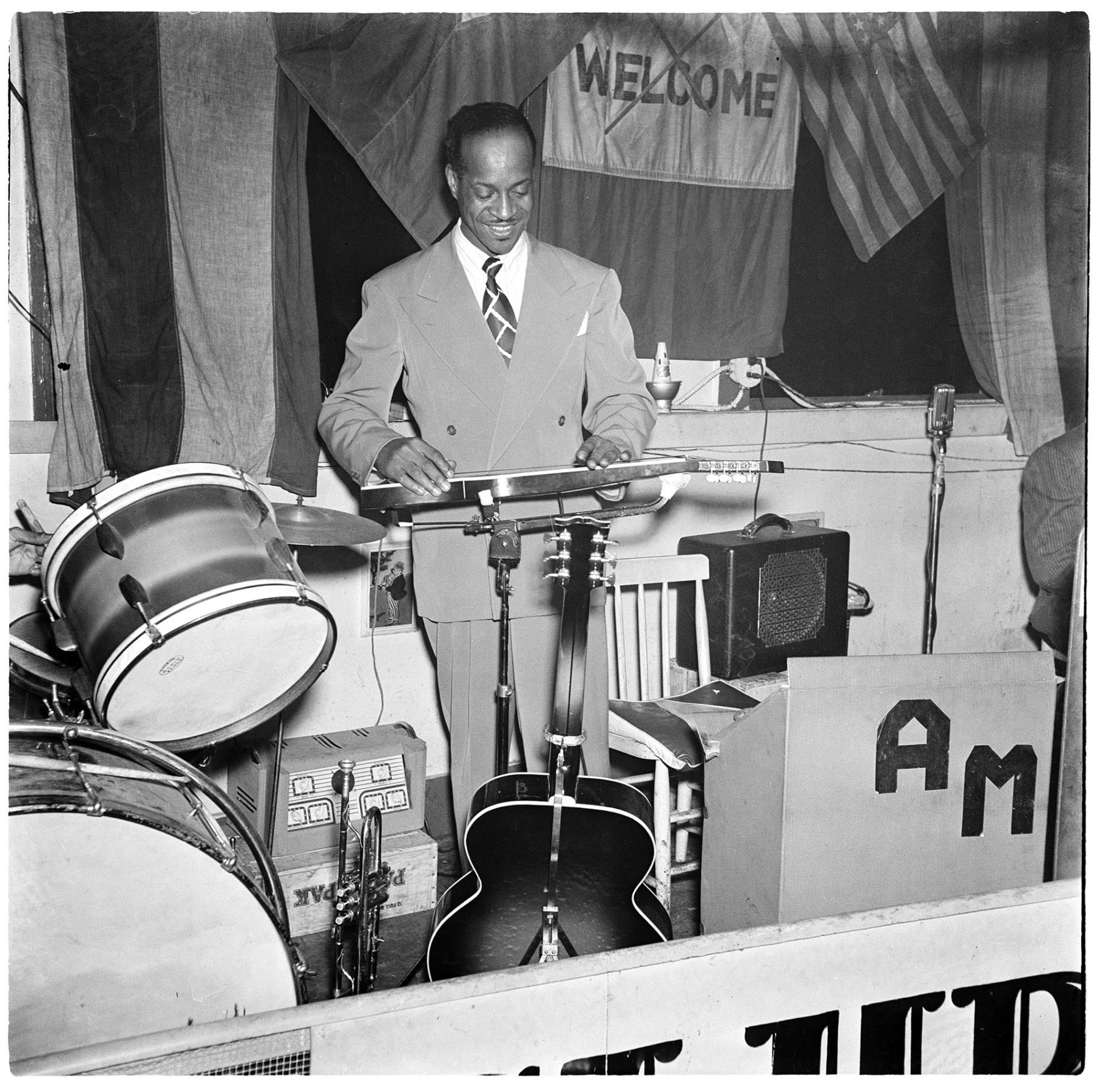 Image of Slide guitar player at Club Rizal, Seattle, 1944