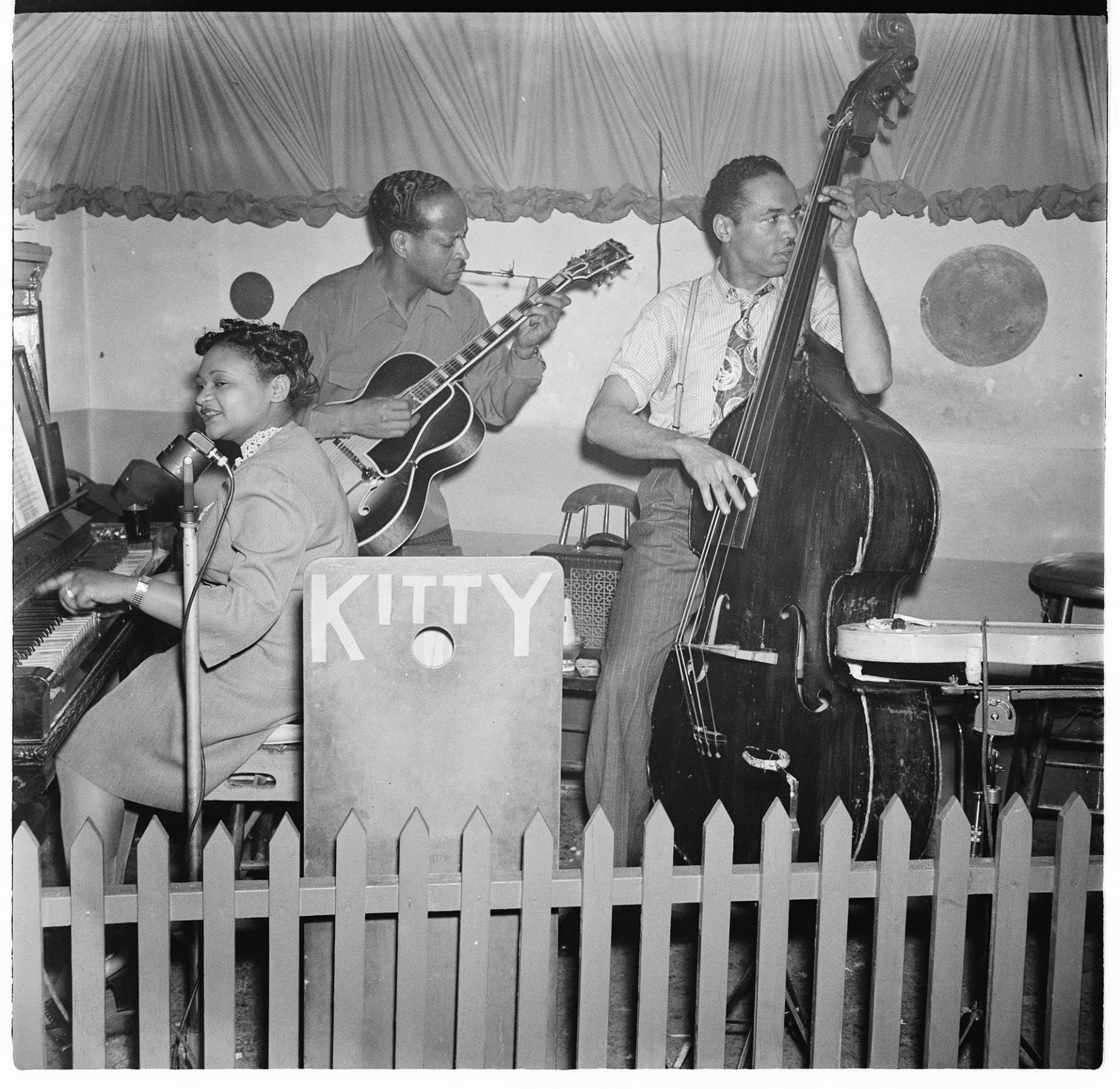 Image of Jazz trio on stage at Basin Street club, Seattle, April 7, 1945