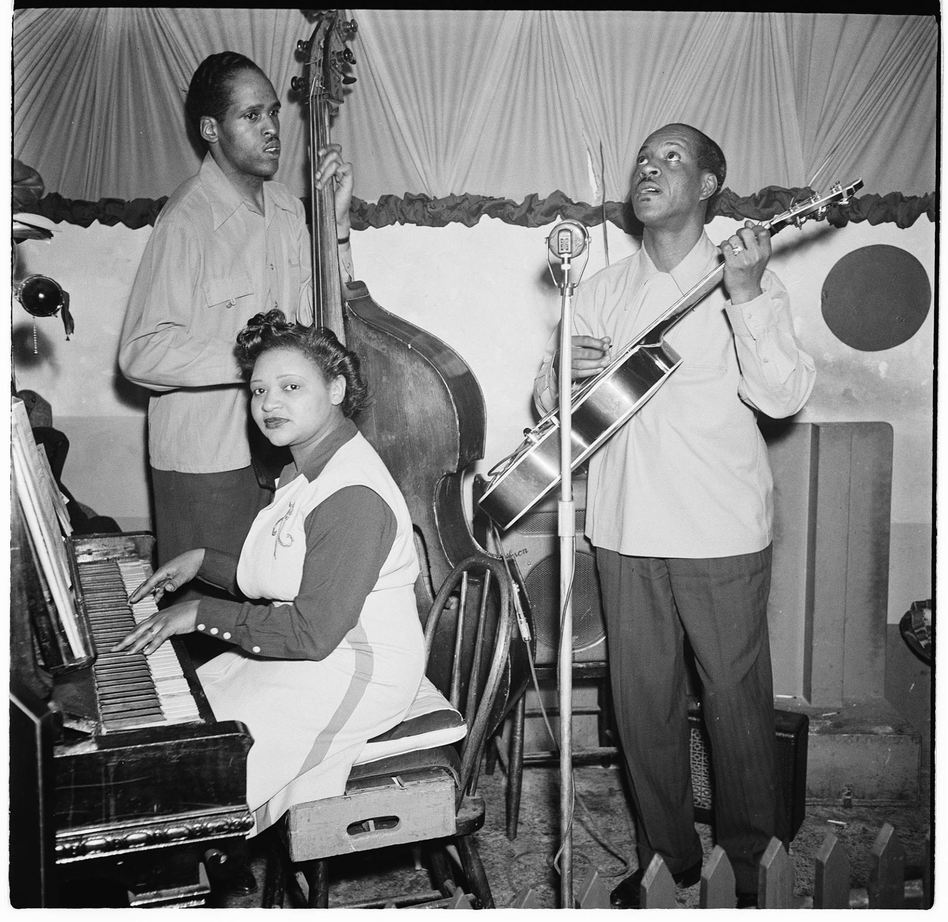 Image of Jazz trio on stage at the Basin Street club, Seattle, March 24, 1945