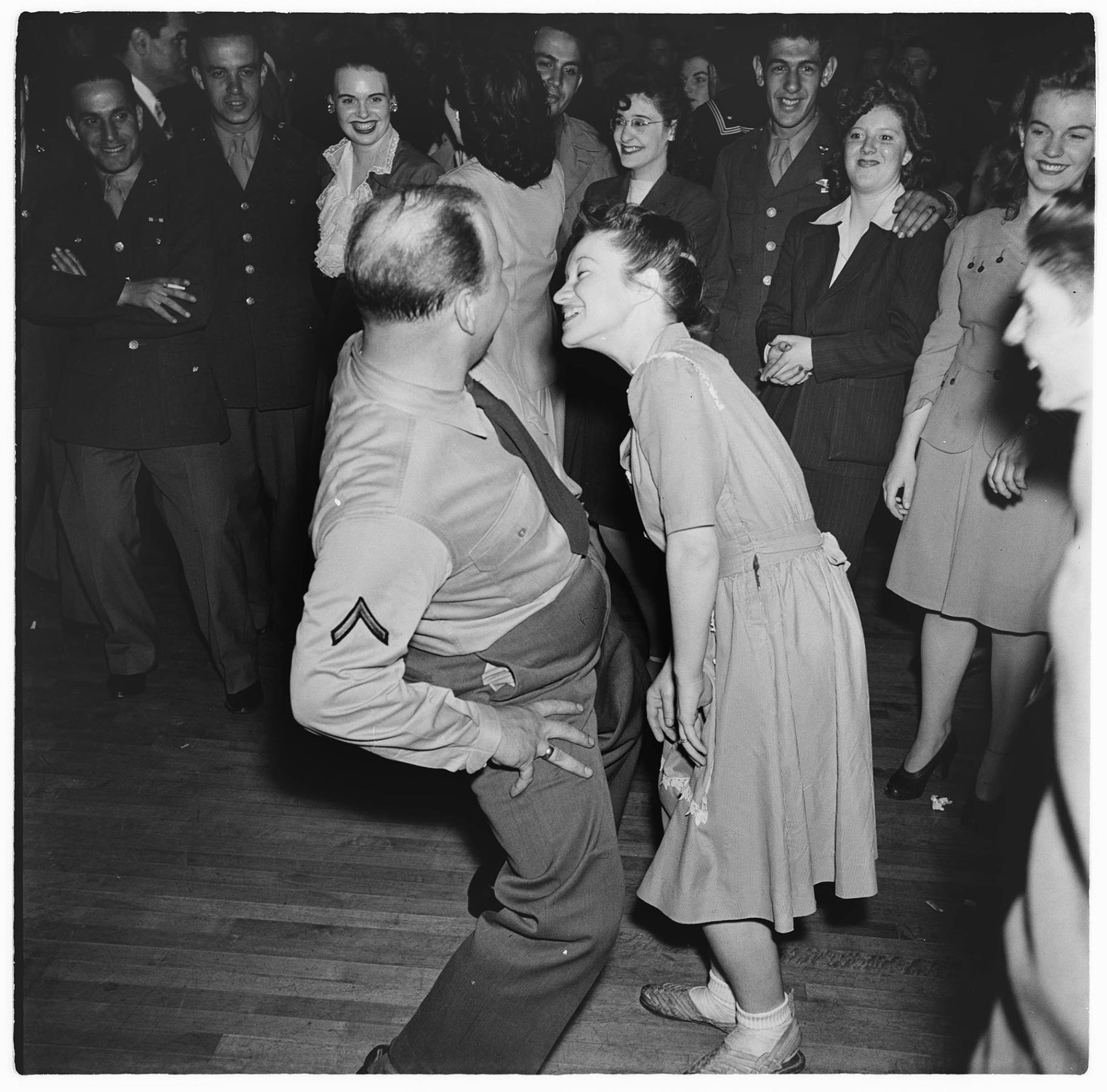 Image of Couple dancing, with onlookers, Seattle, circa 1944