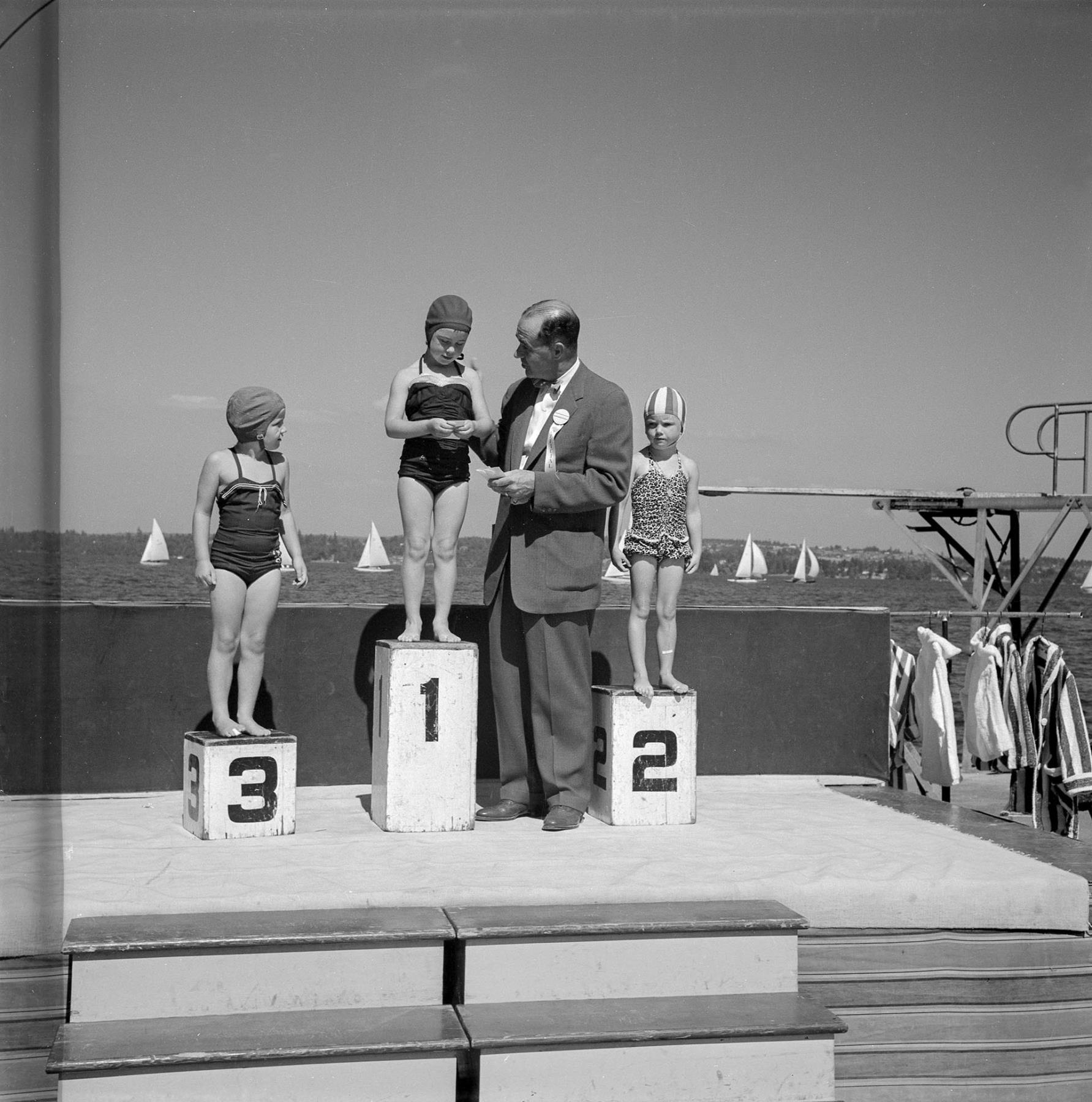 Image of Swimmers standing on blocks at Madrona Park, Seattle, circa 1953