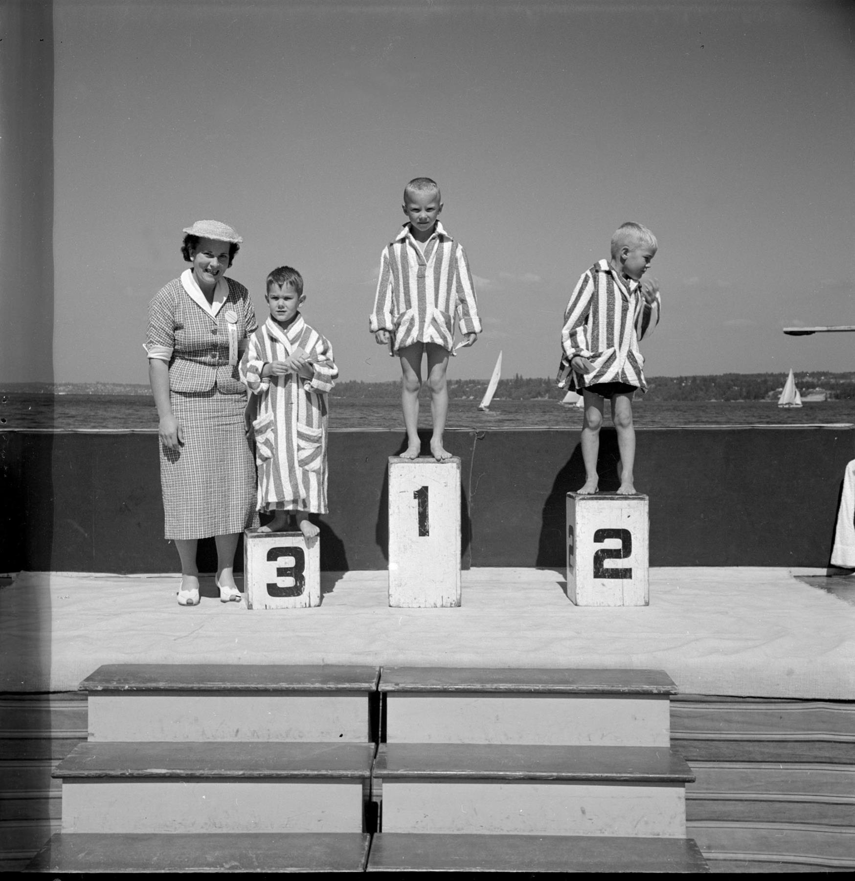 Image of Swimmers standing on blocks at Madrona Park, Seattle, circa 1953