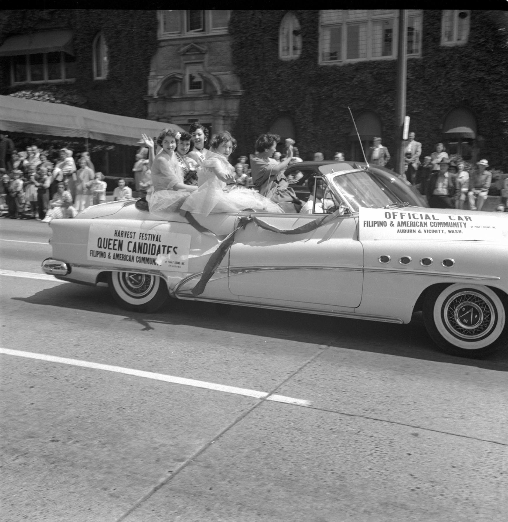 Image of Harvest Festival Queen candidates riding in July 4th parade, Seattle, circa 1953